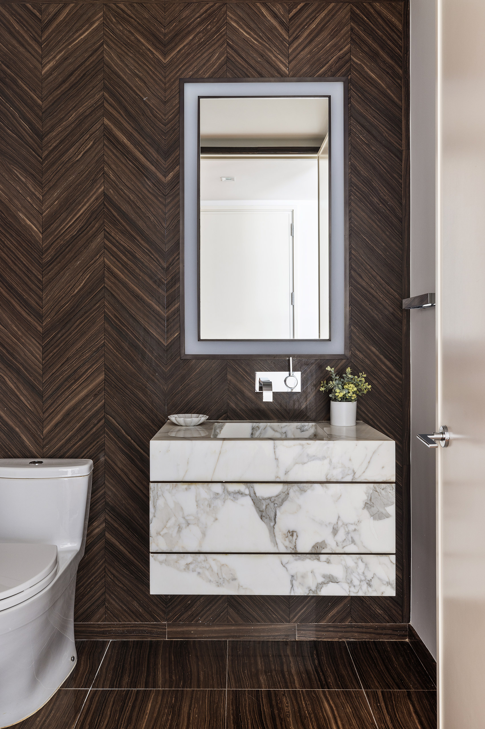 1 West End Avenue, Unit 15E Manhattan, NY 10023 - Photo 8 of 31 a bathroom with a sink and a toilet