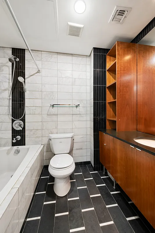 206 Kent Street, Unit 6 Brooklyn, NY 11222 - Photo 7 of 9 a bathroom with a toilet and a shower