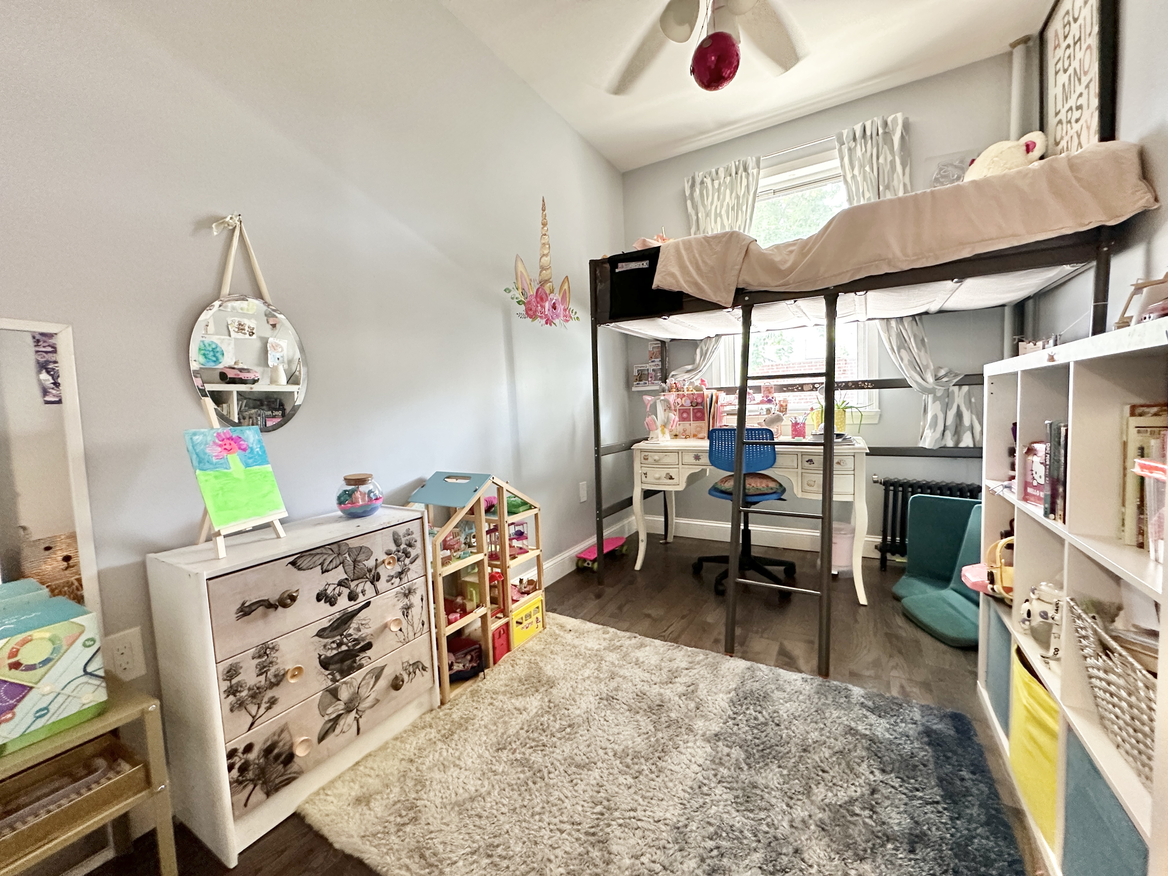 172 Minna Street, Unit 2 Brooklyn, NY 11218 - Photo 6 of 9 a room with fireplace furniture and a dining table