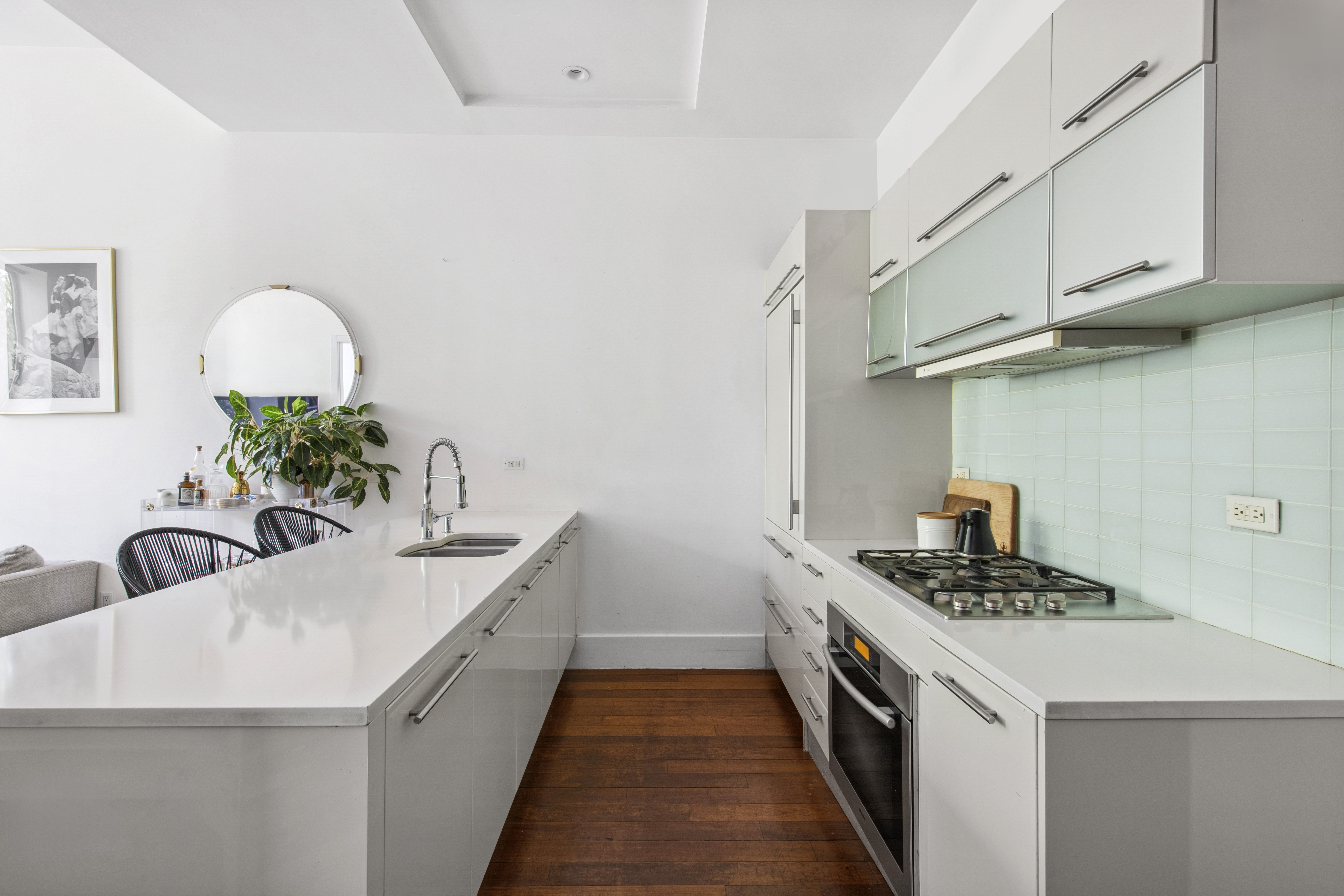 50 Bayard Street, Unit 1B Brooklyn, NY 11211 - Photo 2 of 13 a kitchen with sink and stove