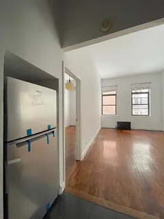 a view of empty room with windows