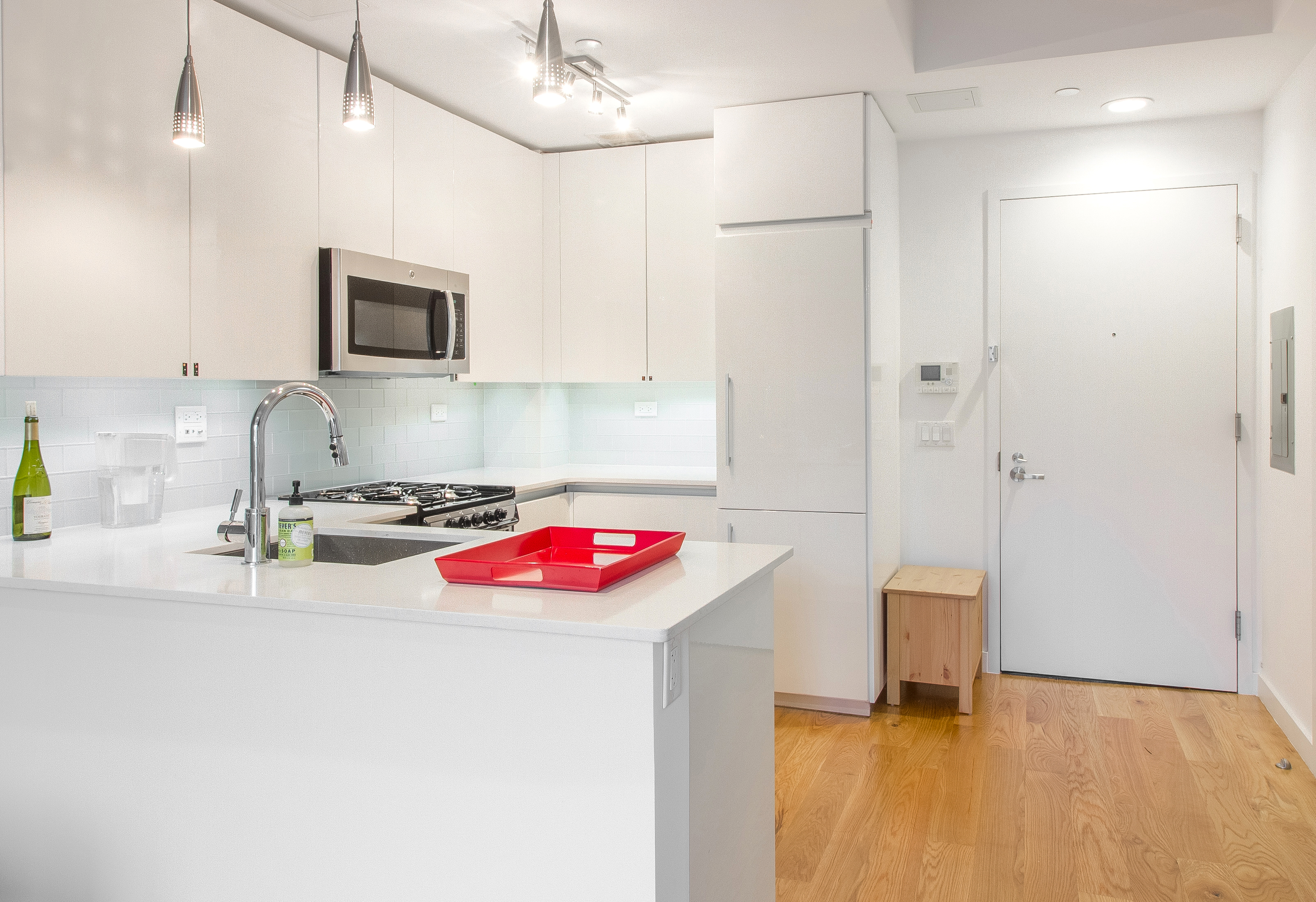 51 East 131st Street, Unit 6A Manhattan, NY 10037 - Photo 4 of 12 a kitchen with a sink and a stove