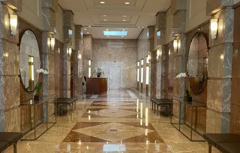 a bathroom with a glass door shower