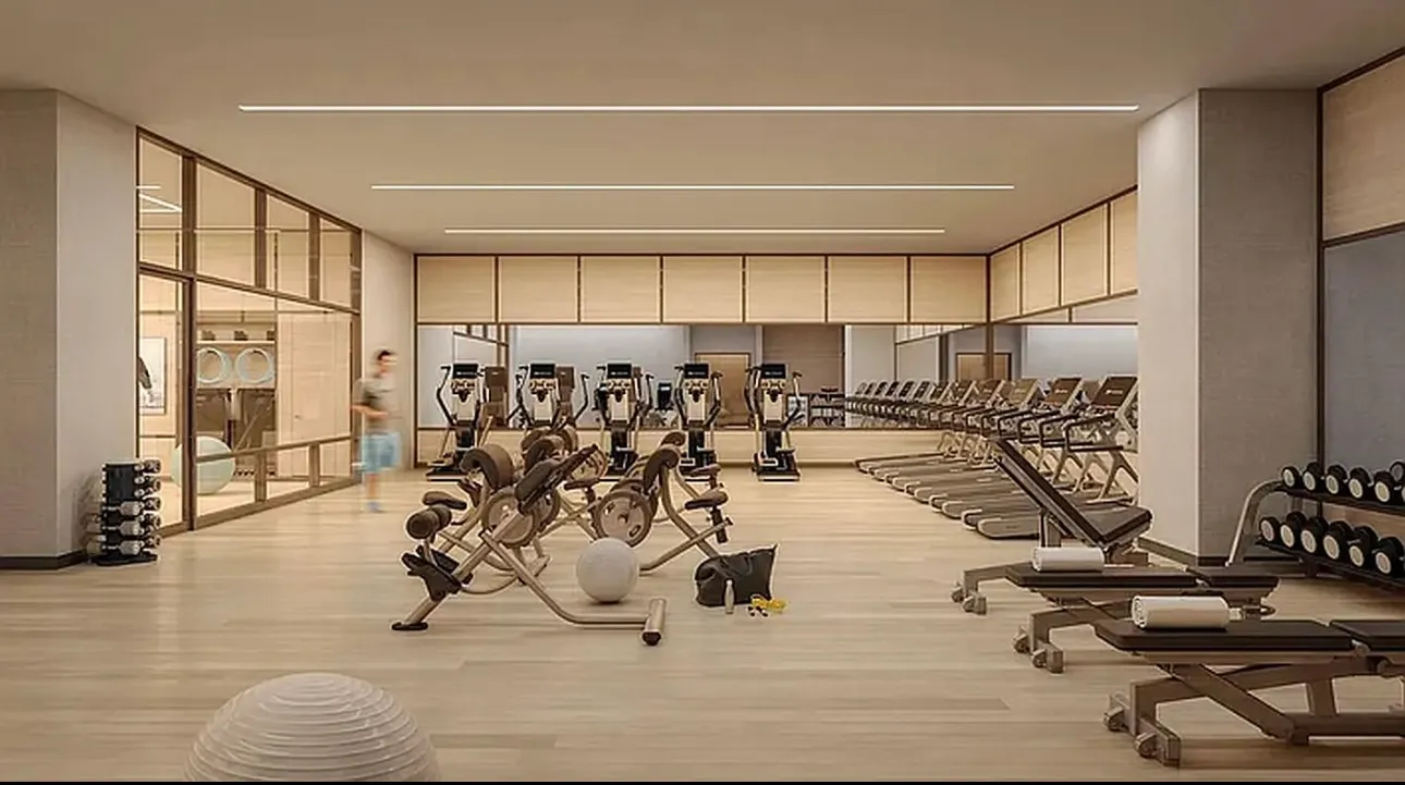 a living room with furniture and floor to ceiling windows