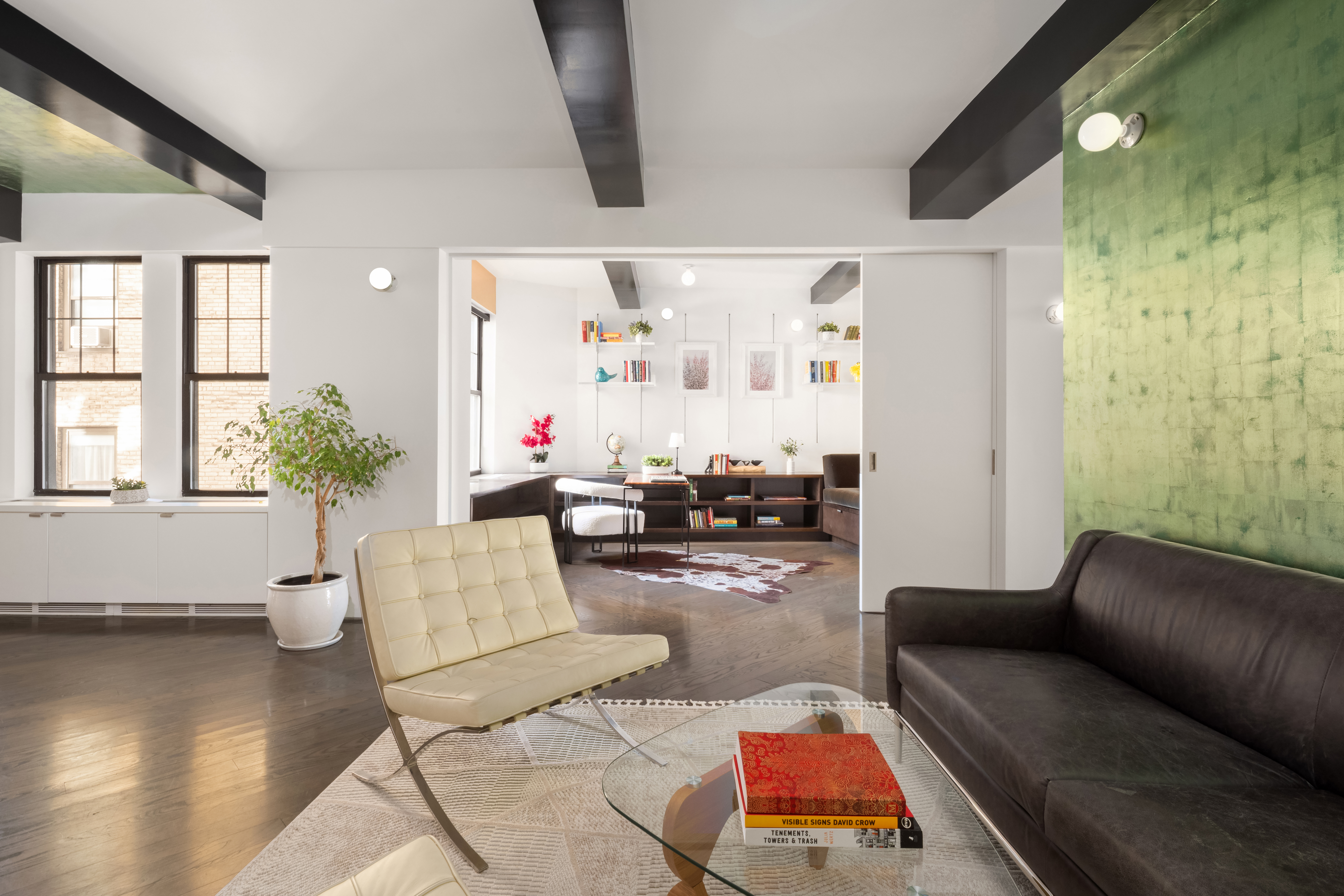 170 2nd Avenue, Unit 5A Manhattan, NY 10003 - Photo 1 of 15 a living room with furniture and wooden floor