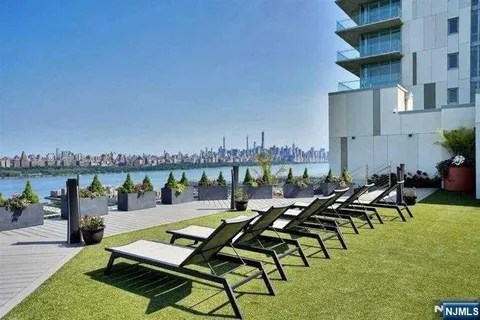 an outdoor space with furniture