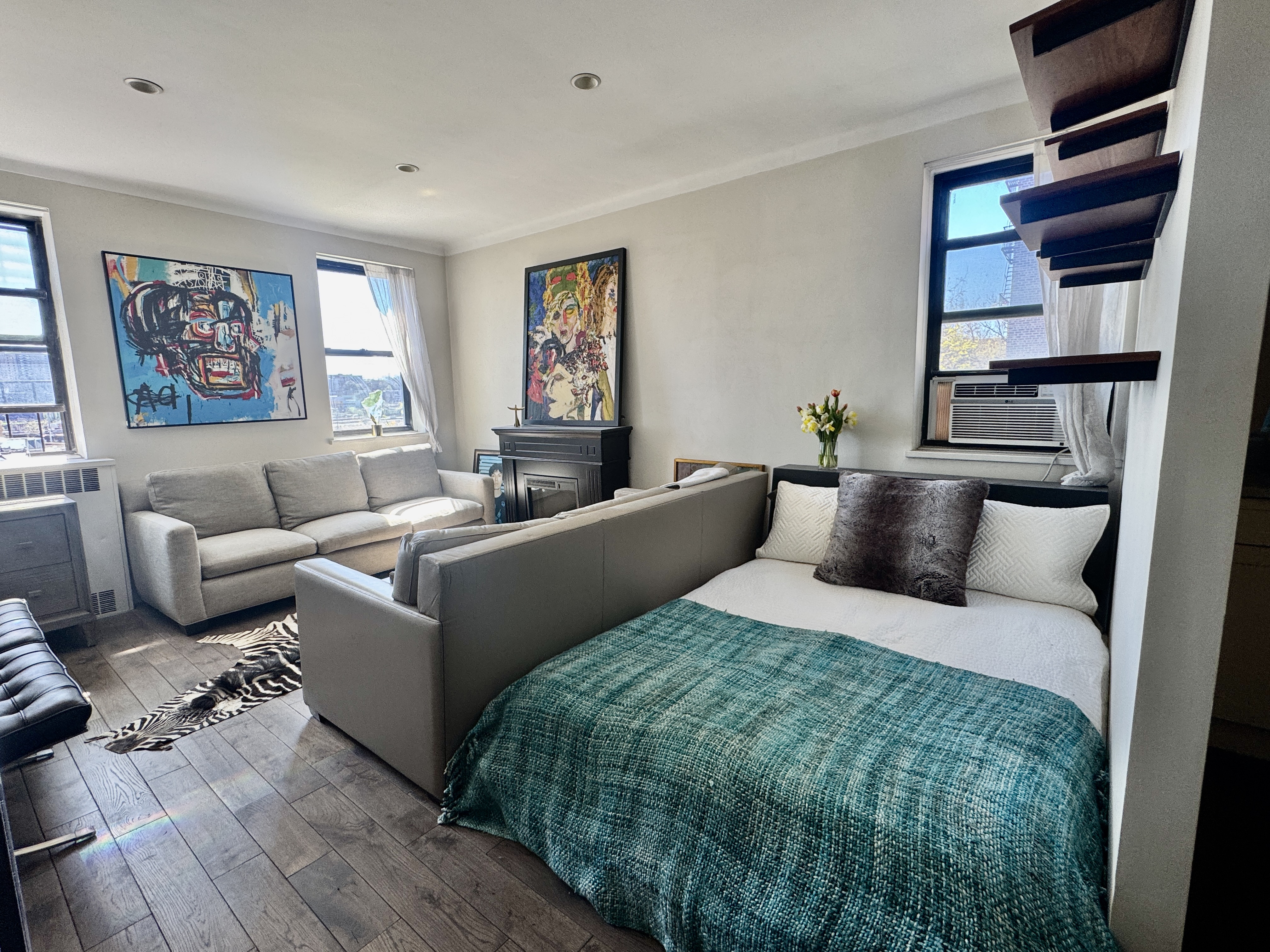 90 Park Terrace East, Unit 3B Manhattan, NY 10034 - Photo 2 of 13 a living room with furniture wooden floor and window