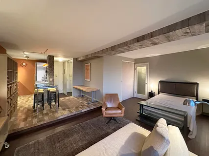 a living room with furniture and a table