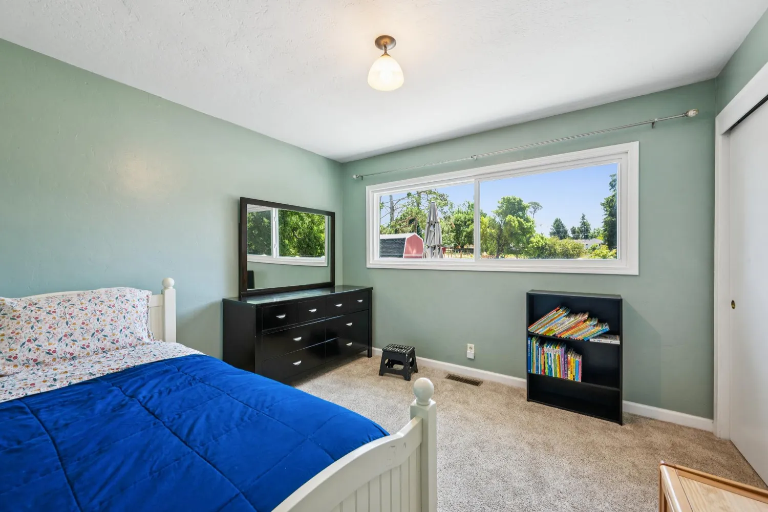 a fire hydrant in the middle of a field