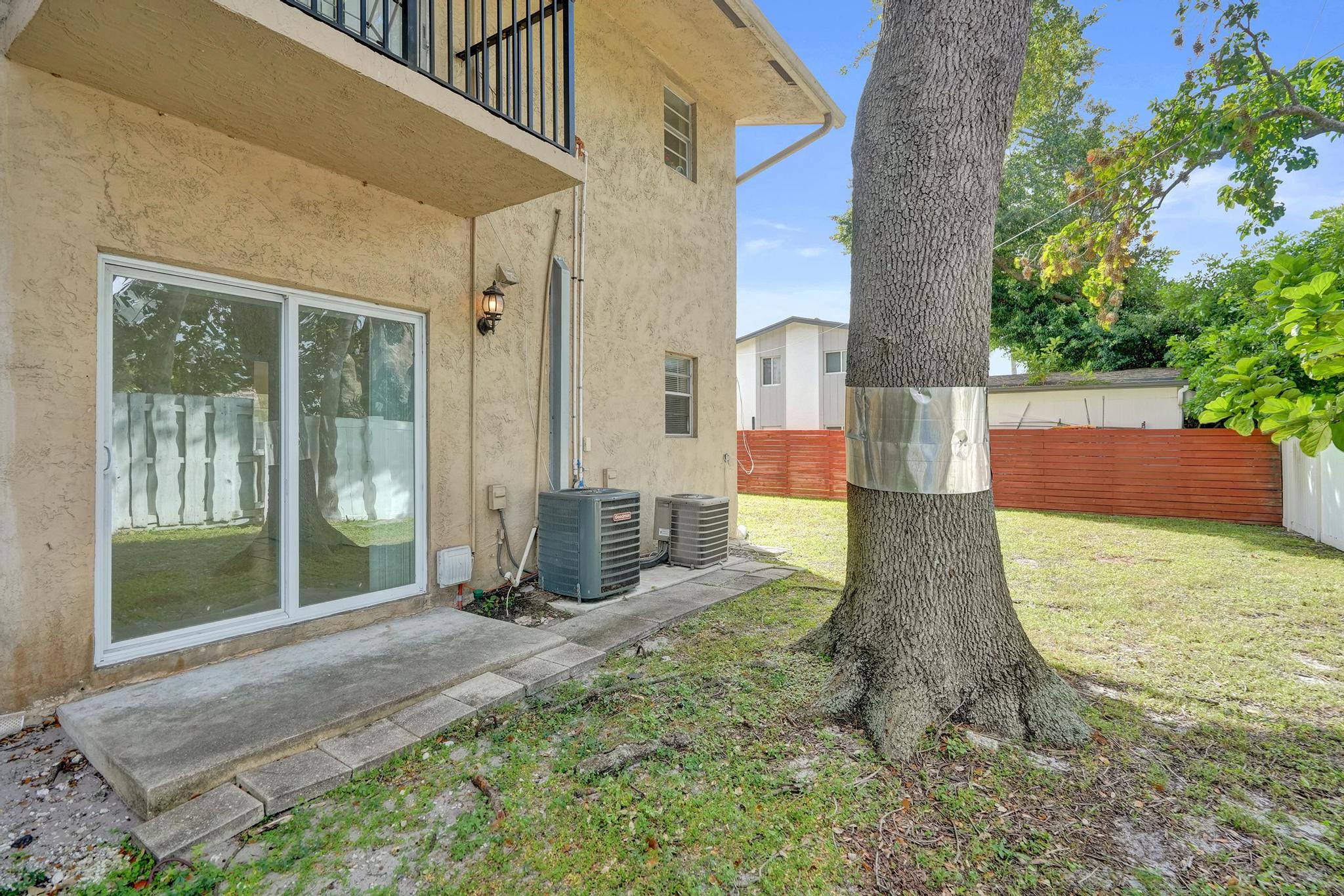 1101 Prospect Road Fort Lauderdale, FL 33309 - Photo 10 of 34 a view of a house with backyard and garden