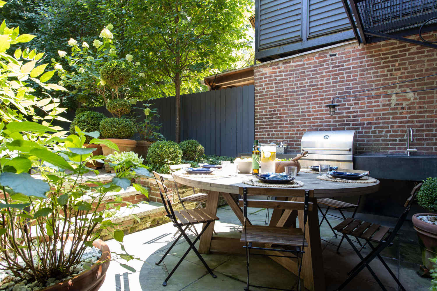 315 Adelphi Street Brooklyn, NY 11205 - Photo 12 of 31 a backyard with table and chairs
