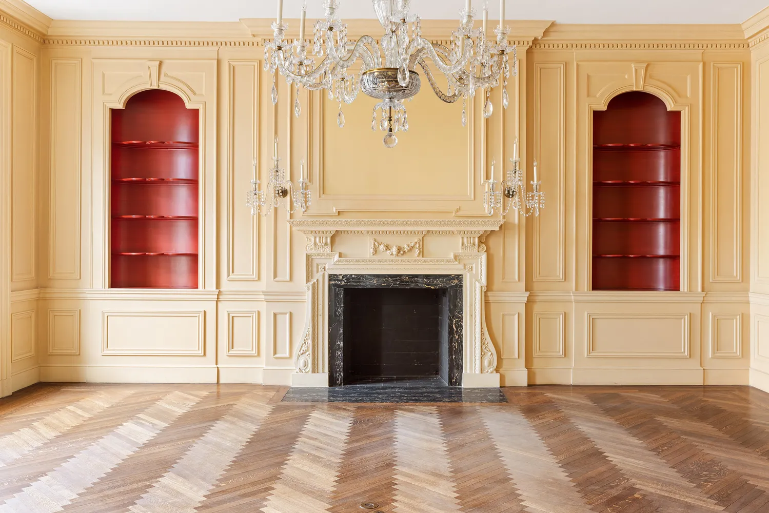 a view of a livingroom with a fireplace and window