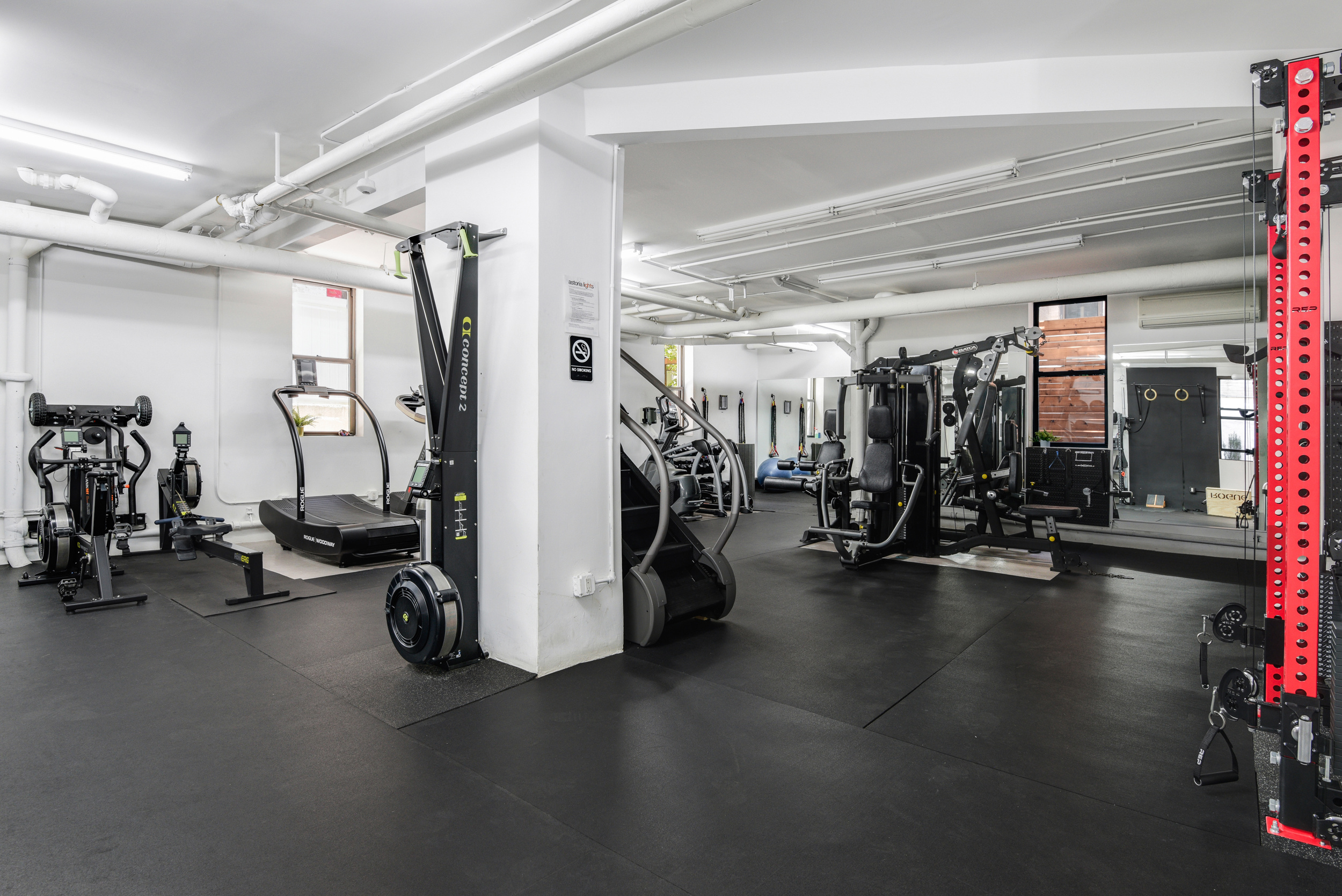 24-75 38th Street, Unit A1 Queens, NY 11103 - Photo 10 of 12 a view of a room with gym equipment