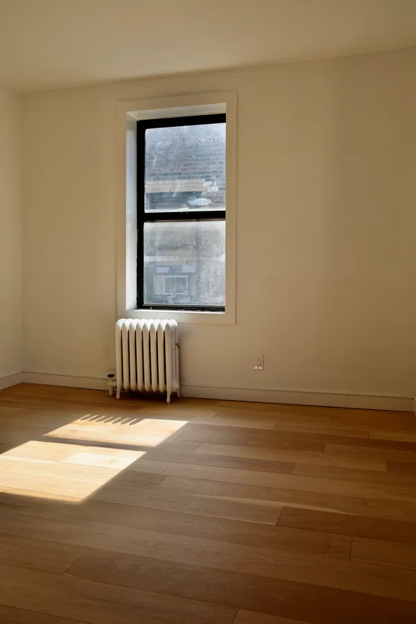 an empty room with windows