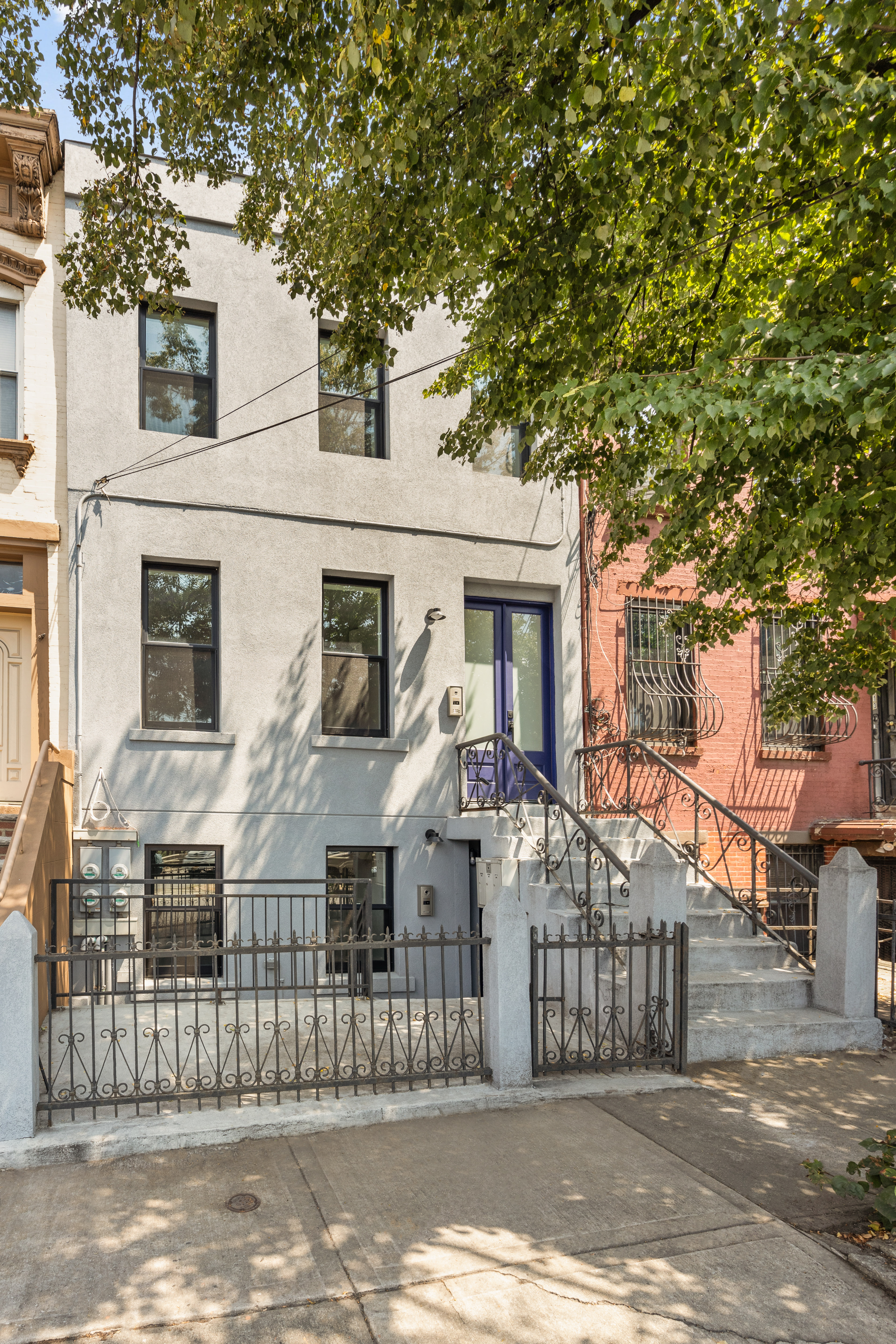 111 Nelson Street, Unit GARDEN Brooklyn, NY 11231 - Photo 10 of 11 a front view of a house with a small yard