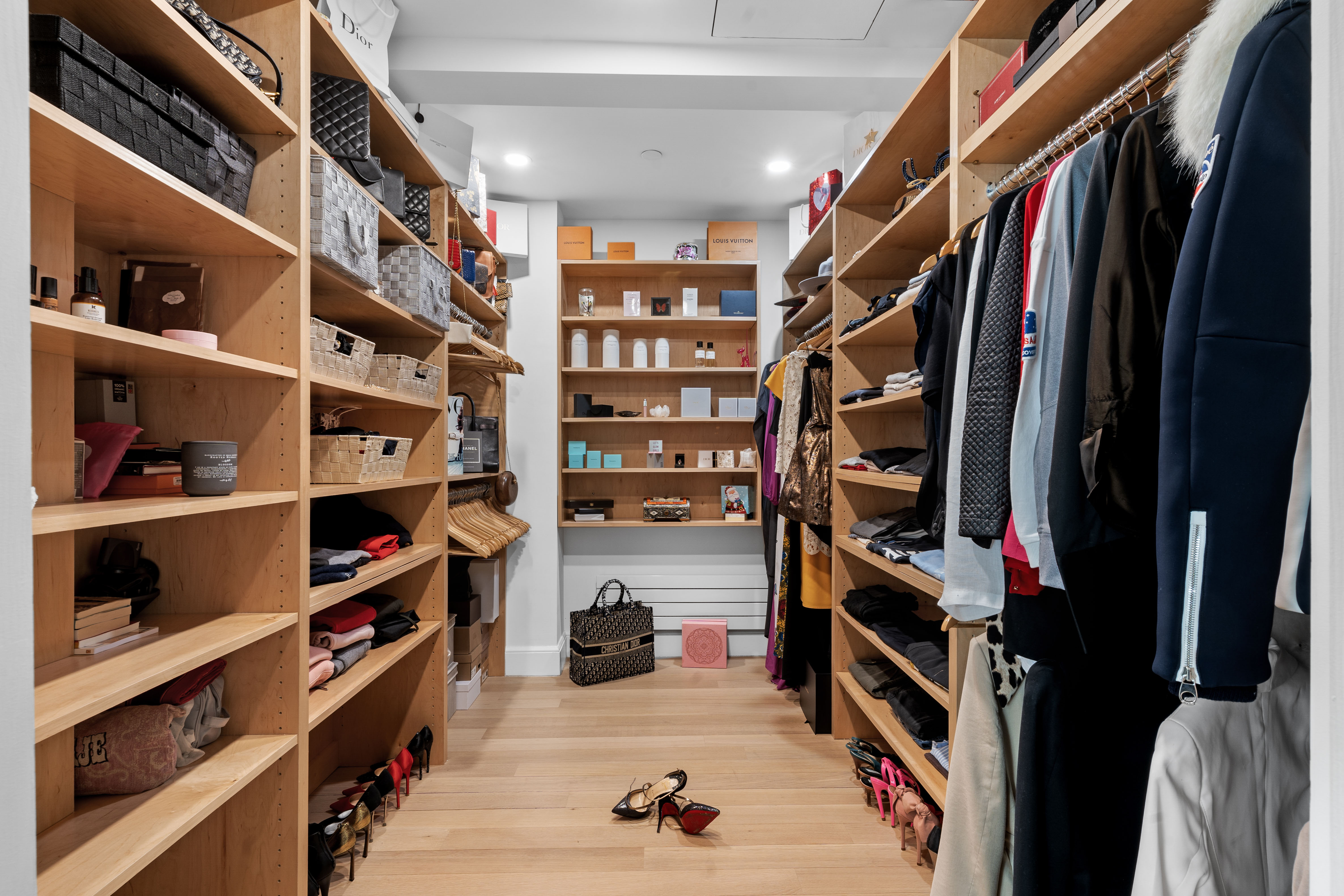 155 Noble Street, Unit 3 Brooklyn, NY 11222 - Photo 9 of 23 a view of walk in closet with clothes and shoes