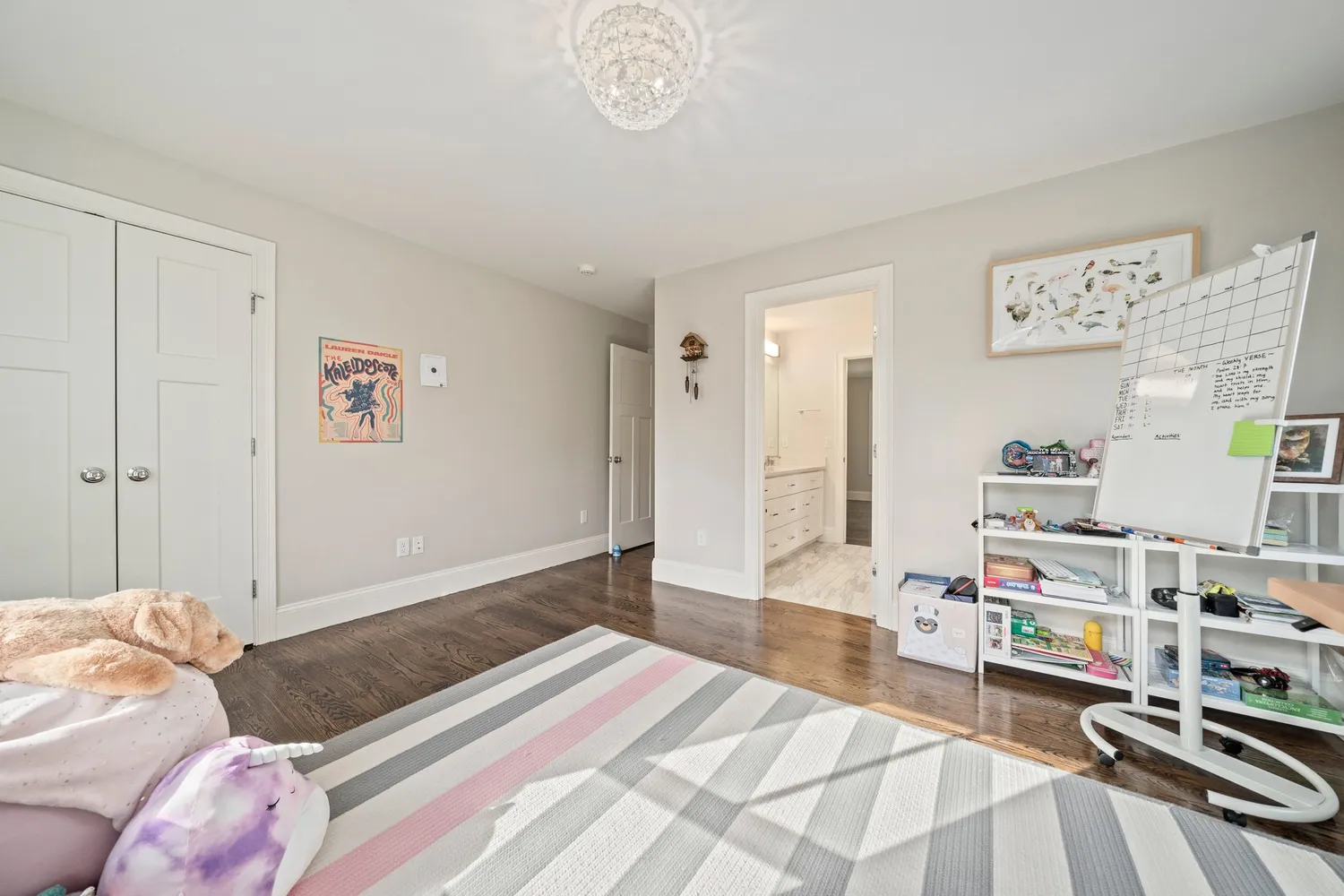 a white toilet sitting next to a bath tub