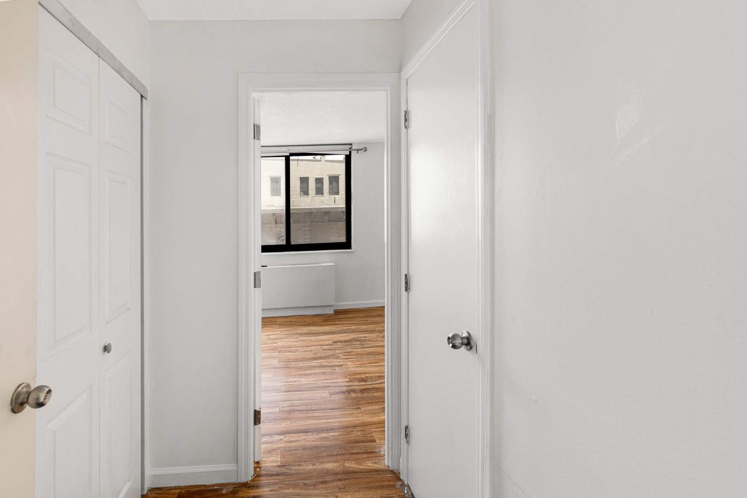 376 Broadway, Unit 8F Manhattan, NY 10013 - Photo 9 of 20 a door with wooden floor