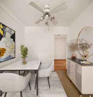 a view of a dining room with furniture