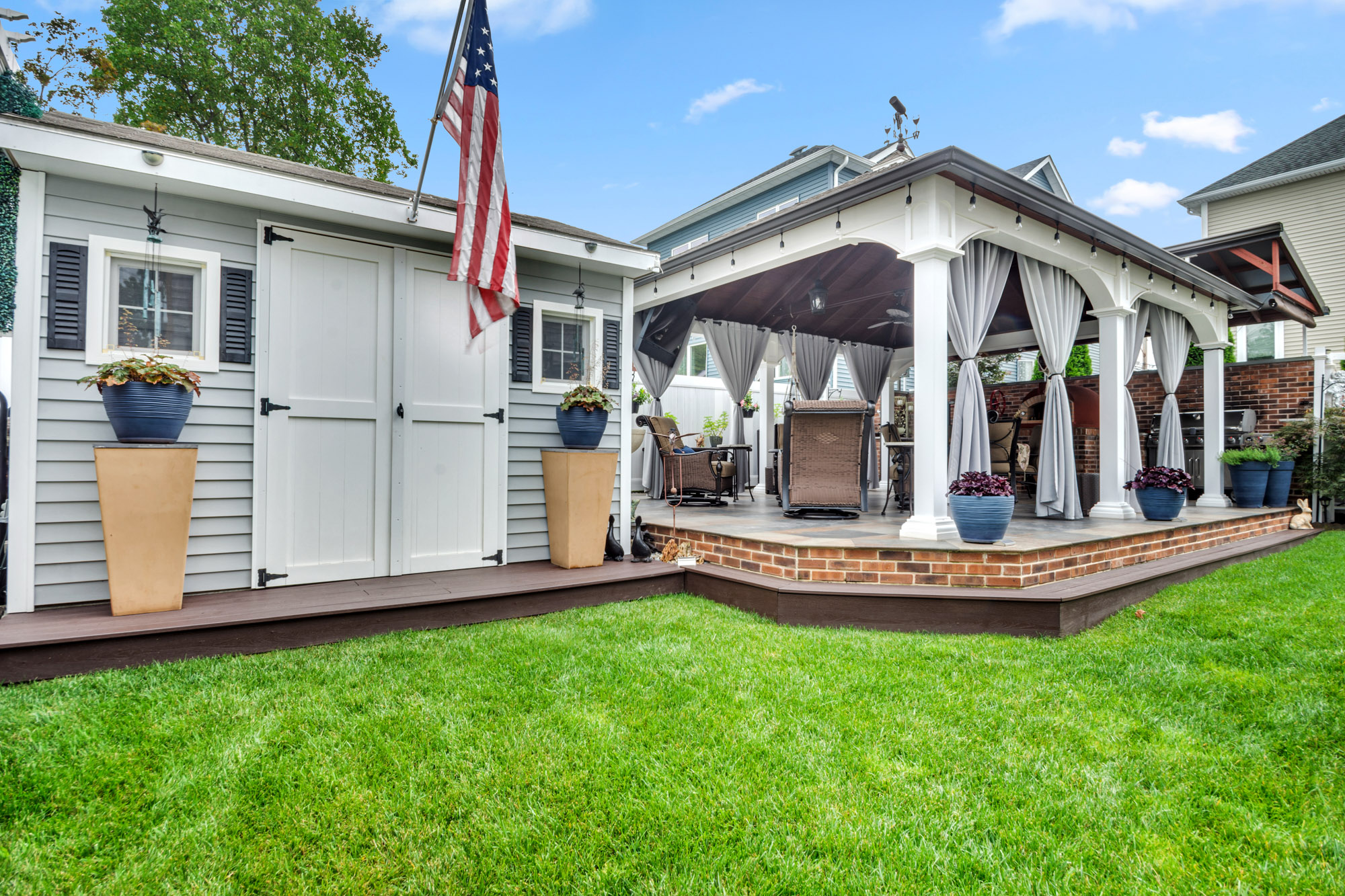 909 Jewett Avenue Staten Island, NY 10314 - Photo 63 of 65 a view of a house with backyard and porch