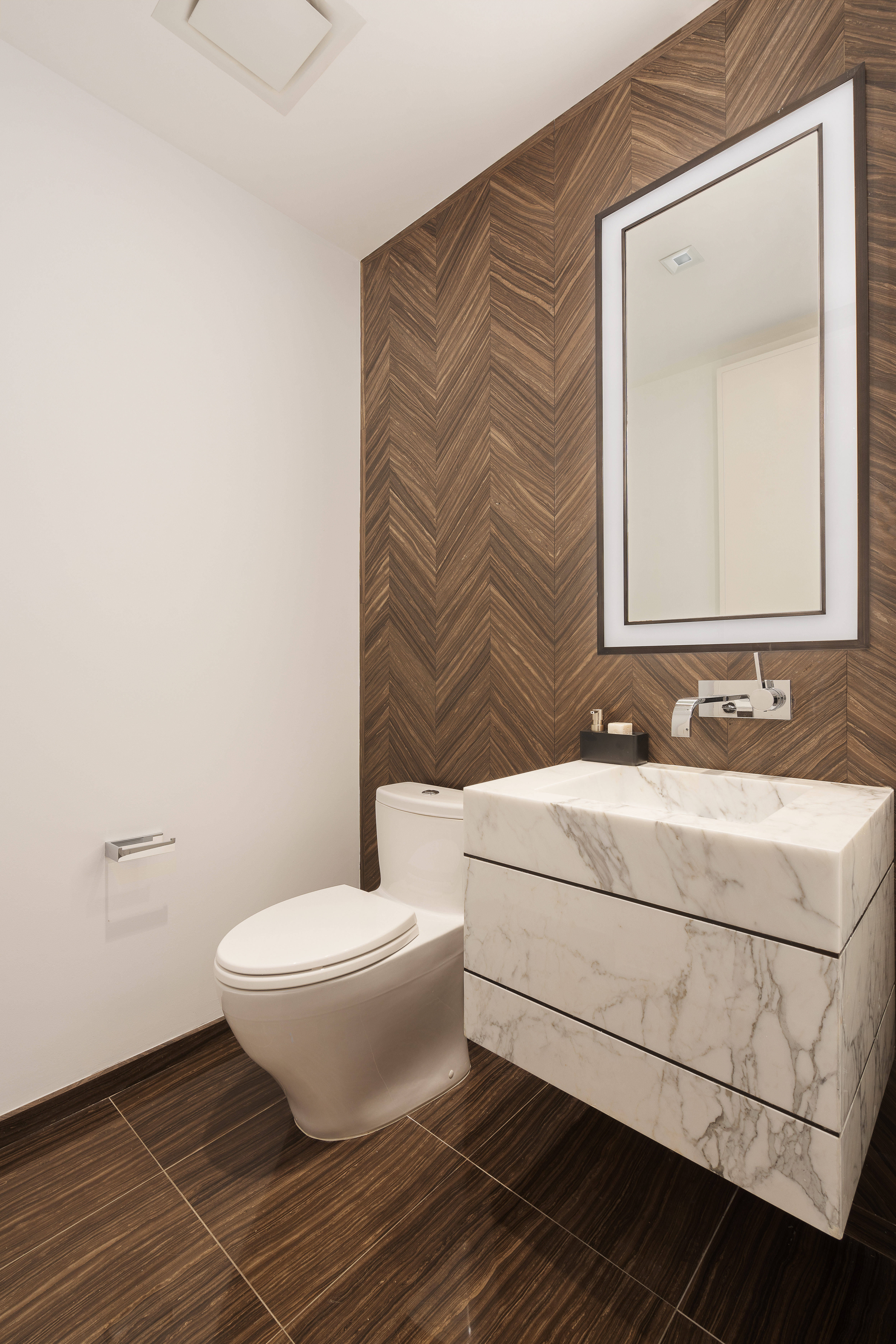 1 West End Avenue, Unit 15J Manhattan, NY 10023 - Photo 9 of 20 a bathroom with a sink toilet and mirror