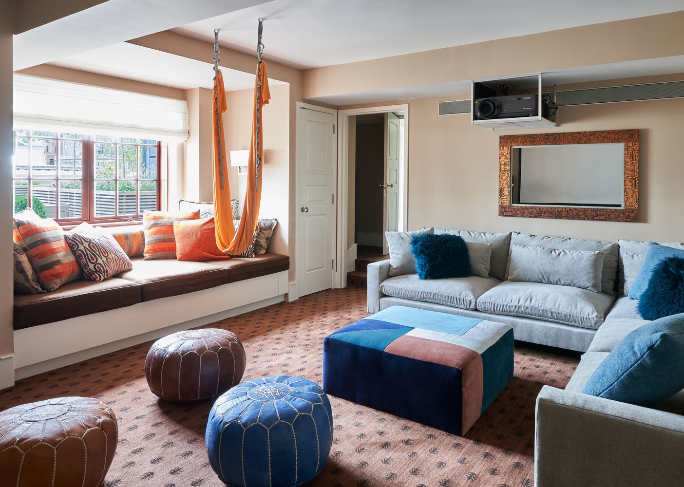 a view of a patio with couches table and chairs and potted plants