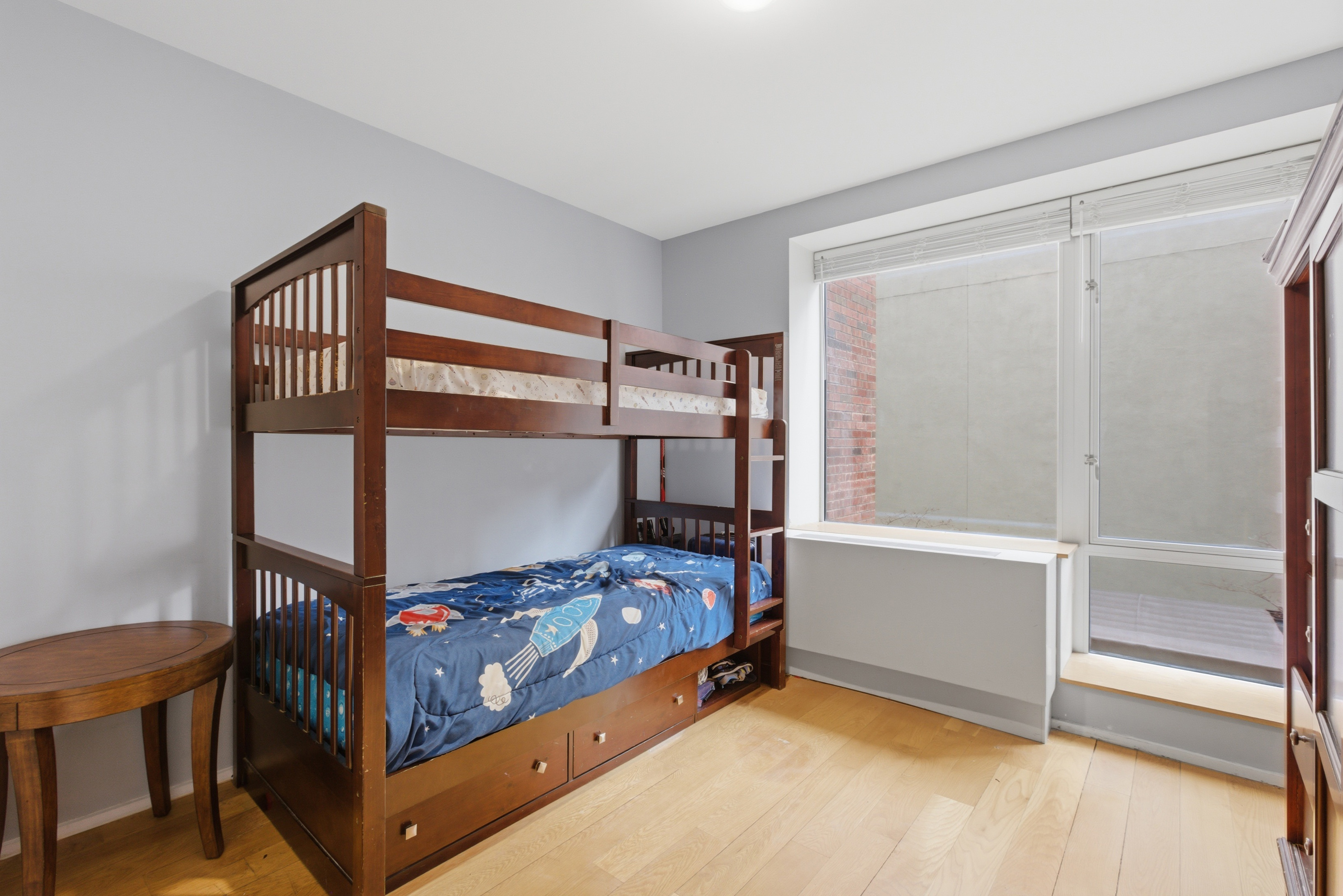 2280 Frederick Douglass Boulevard Manhattan, NY 10027 - Photo 6 of 10 a bedroom with bunk bed
