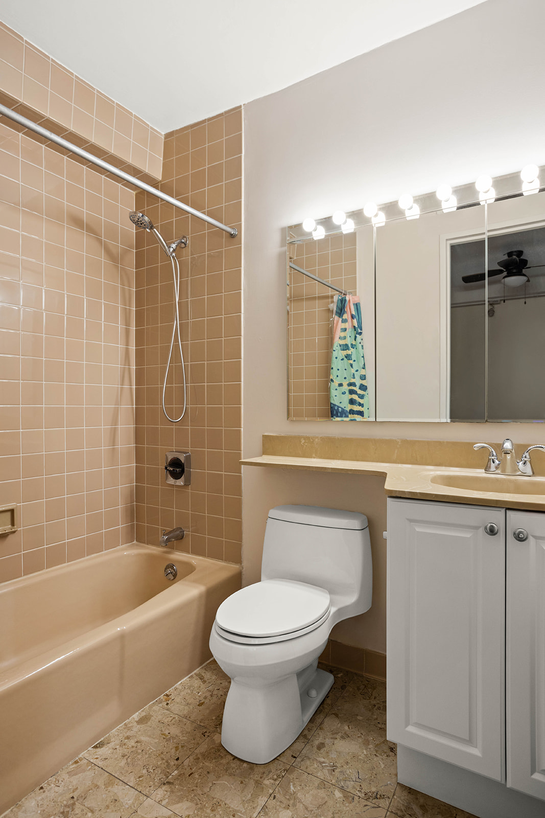 233 East 86th Street, Unit 16A Manhattan, NY 10028 - Photo 6 of 7 a bathroom with a toilet a sink and bathtub