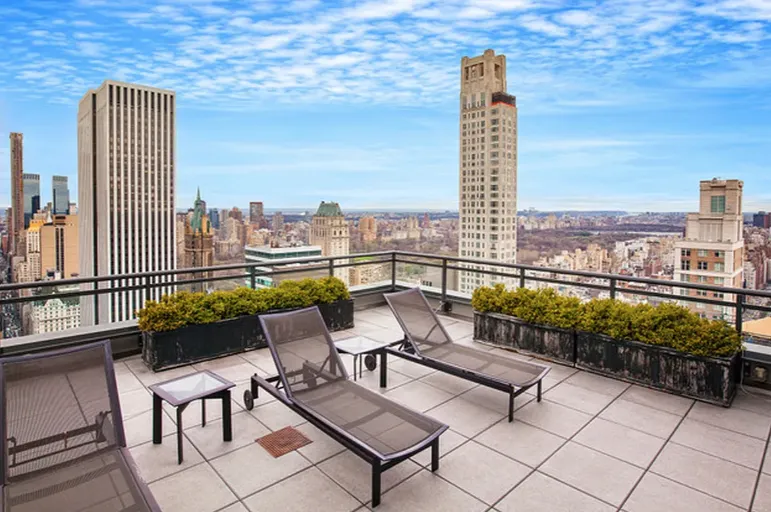 a view of a city with tall buildings