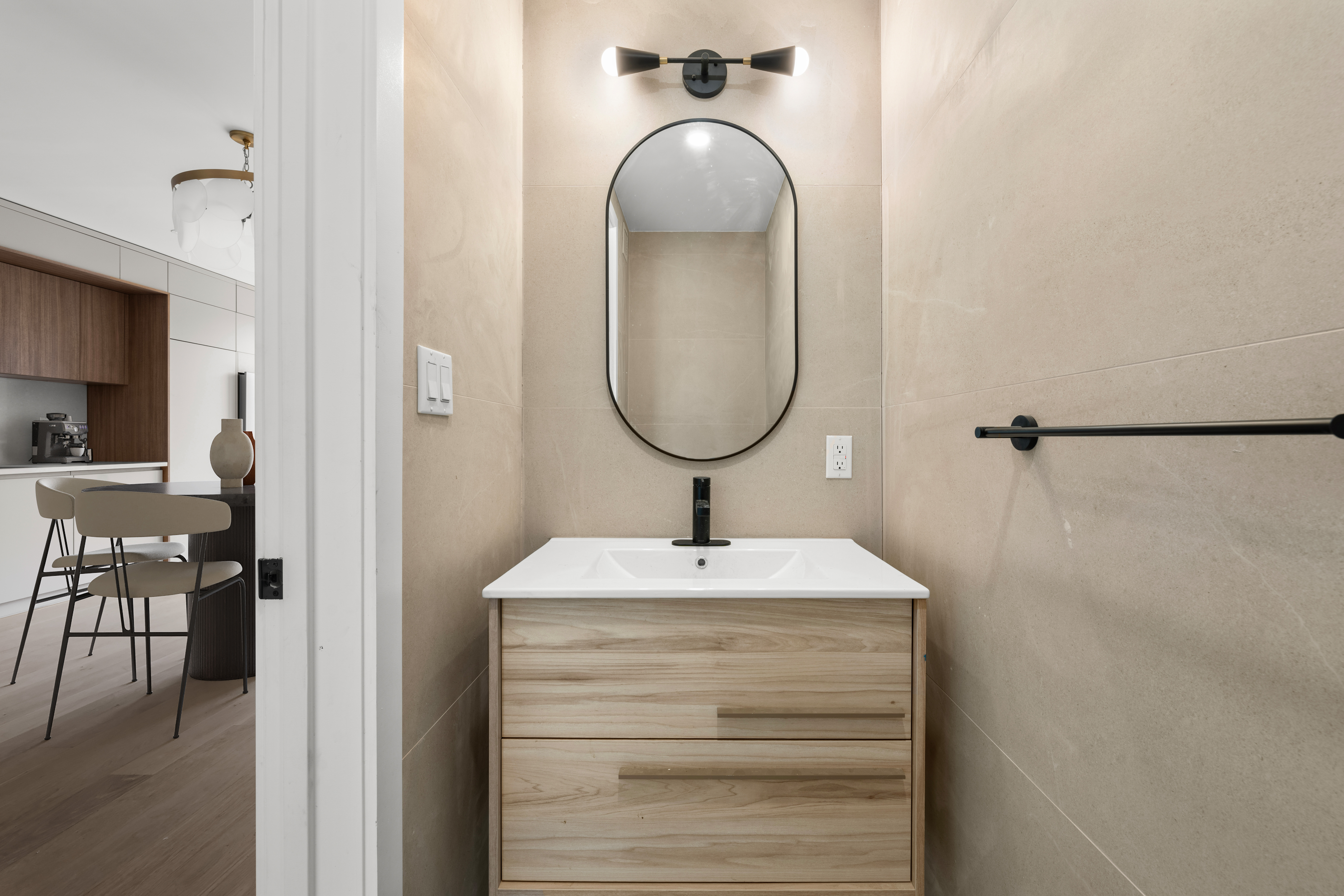 14-35 Broadway, Unit 1A Queens, NY 11106 - Photo 8 of 20 a bathroom with a sink and a mirror