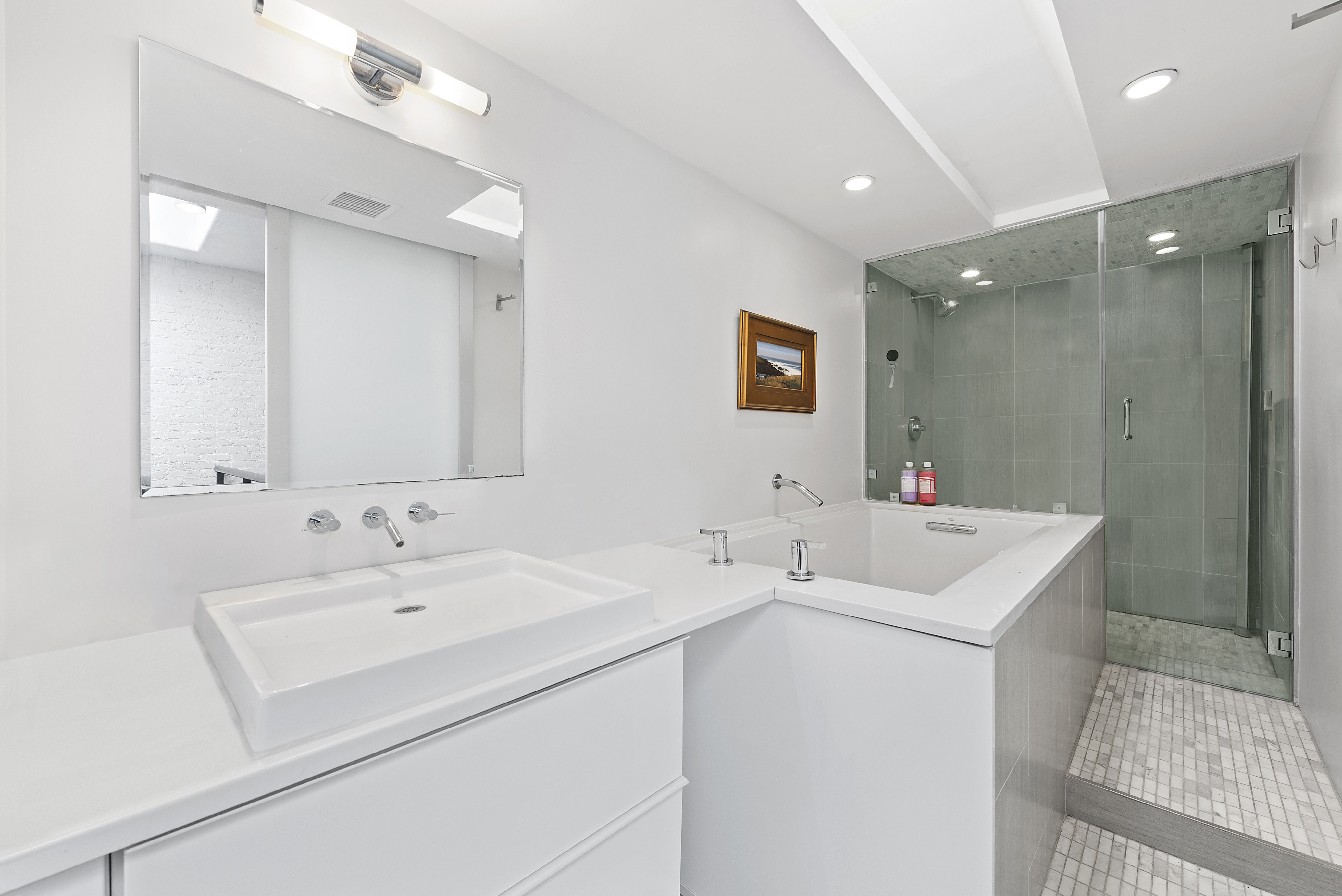 22 West 120th Street Manhattan, NY 10027 - Photo 16 of 21 a bathroom with a sink and a mirror