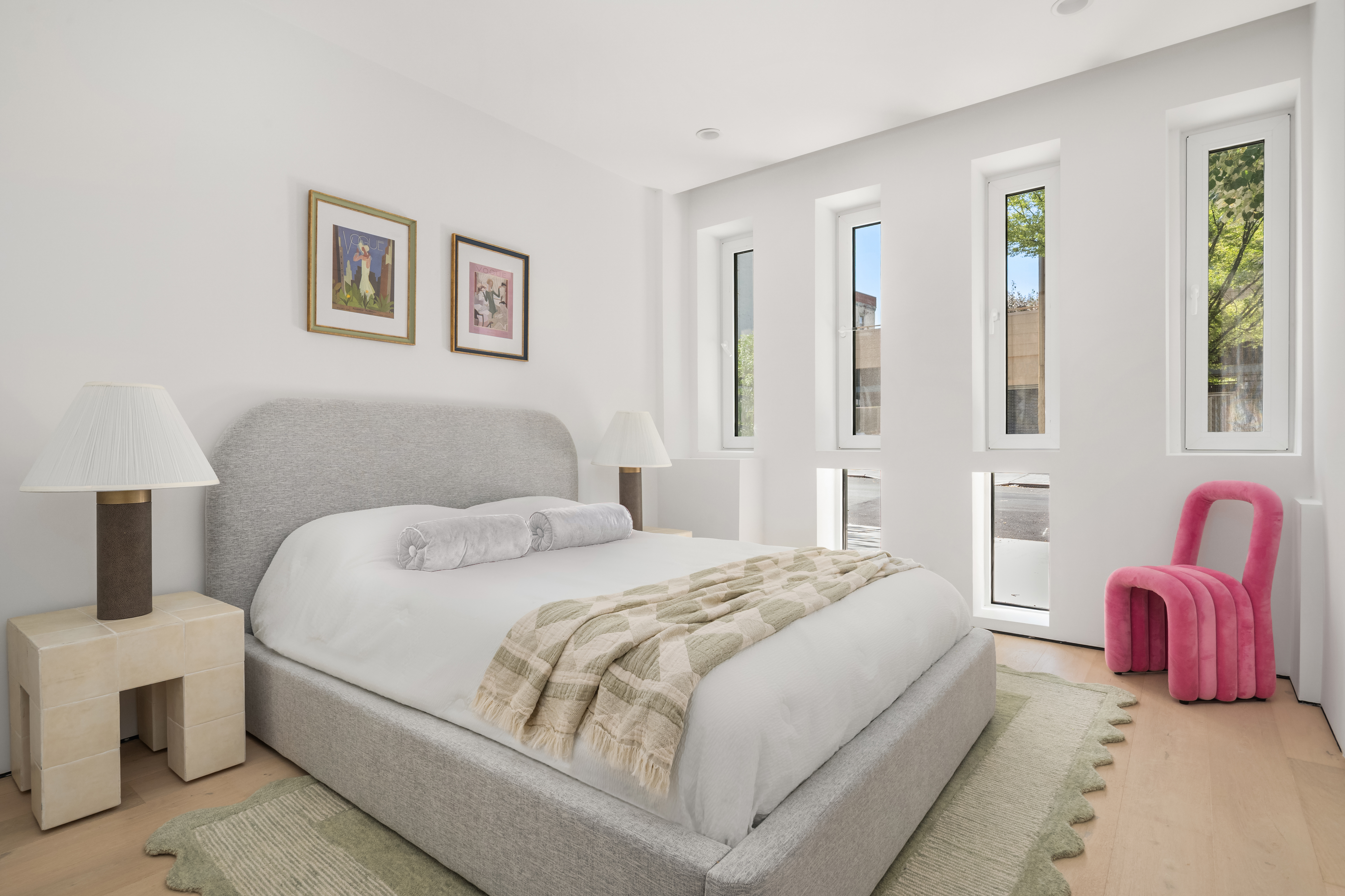 79 South 2nd Street Brooklyn, NY 11249 - Photo 9 of 14 a bedroom with a bed and a couch