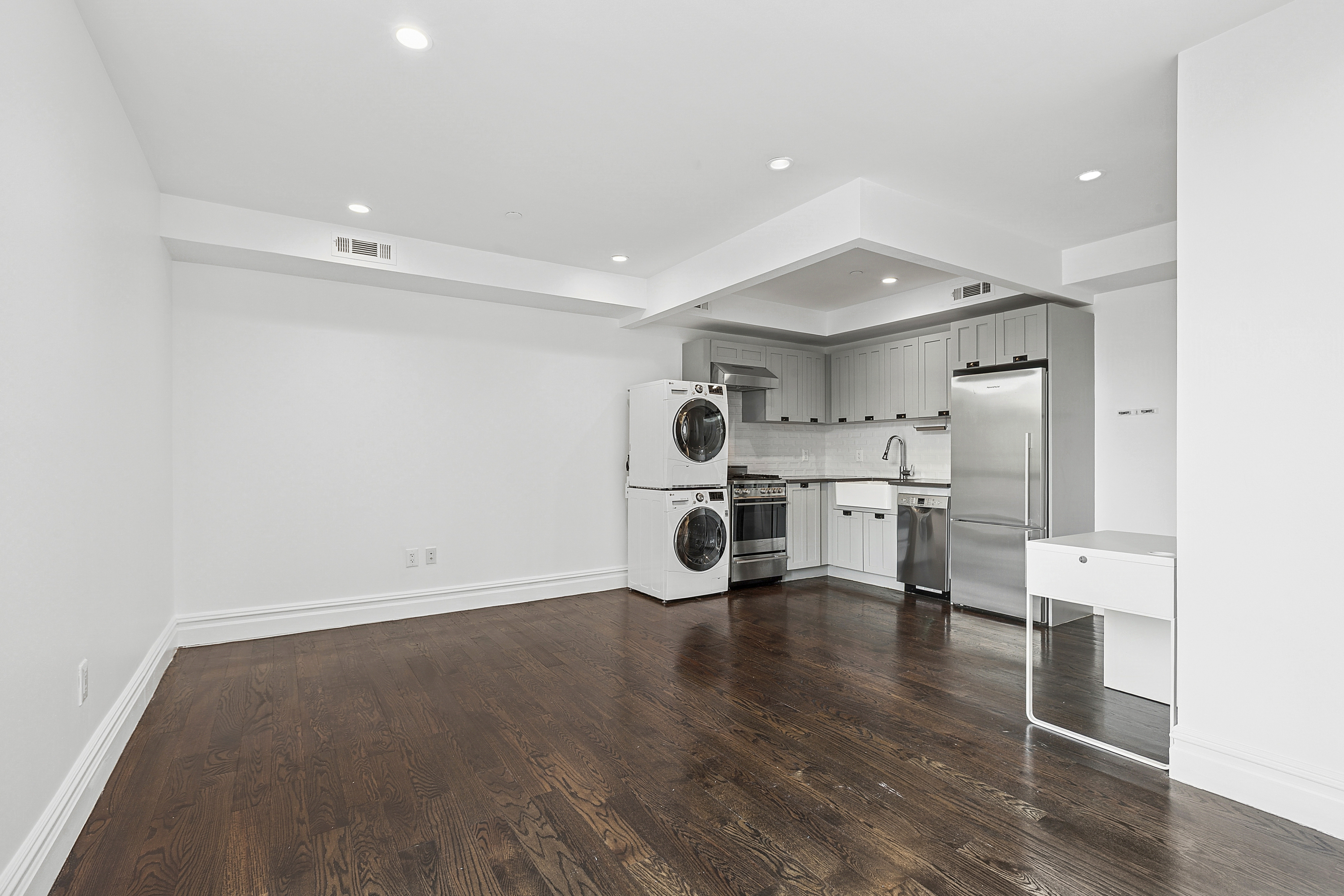 1255 Bushwick Avenue, Unit 3D Brooklyn, NY 11207 - Photo 2 of 6 a view of empty room with wooden floor