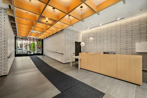 a view of a porch with wooden floor