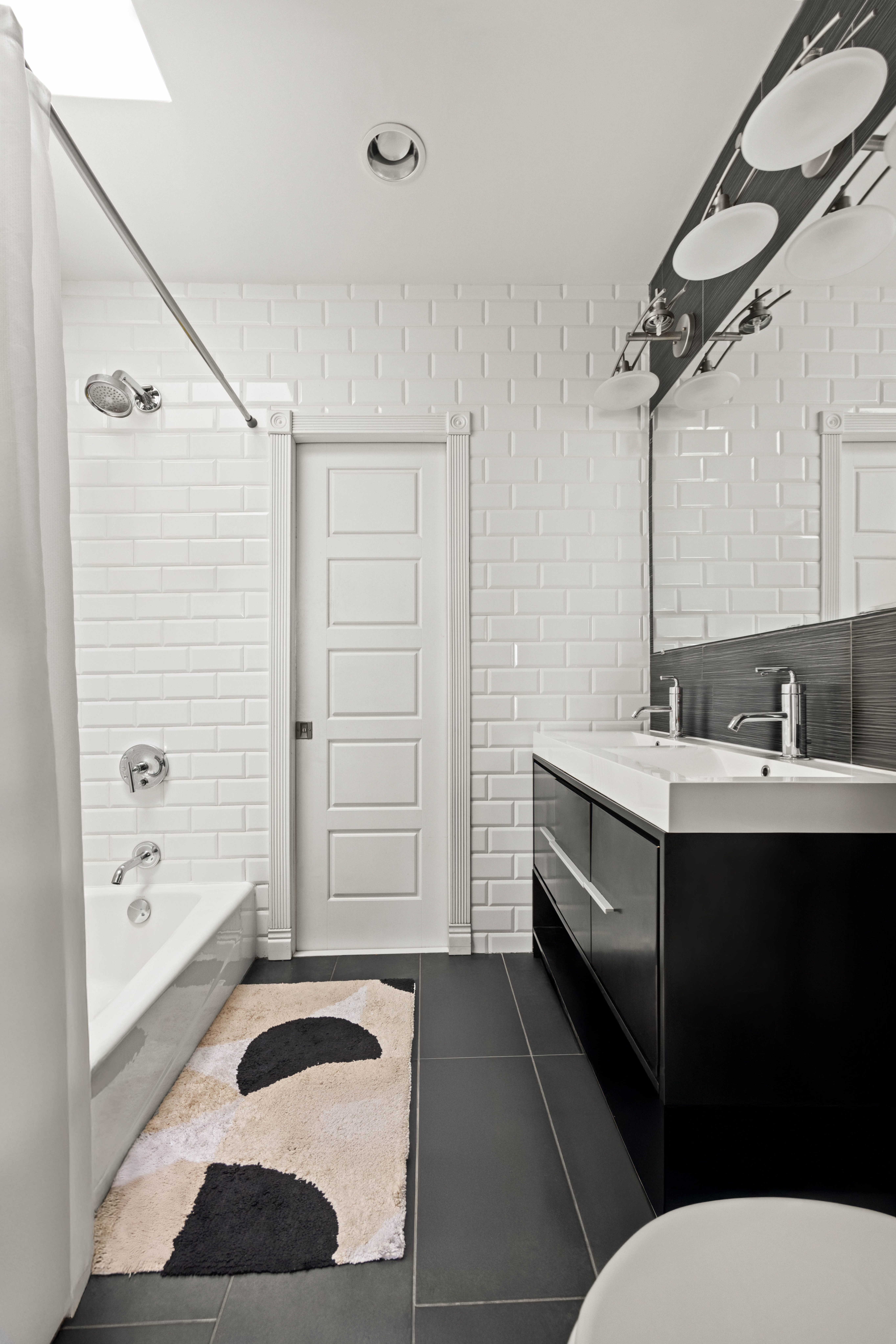 11A Dewey Place Brooklyn, NY 11233 - Photo 6 of 12 a bathroom with a sink a toilet and shower