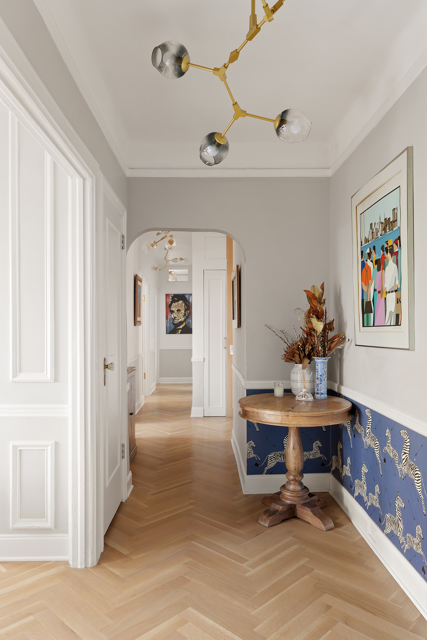 370 Central Park West, Unit PH601 Manhattan, NY 10025 - Photo 14 of 19 a living room with furniture and a chandelier