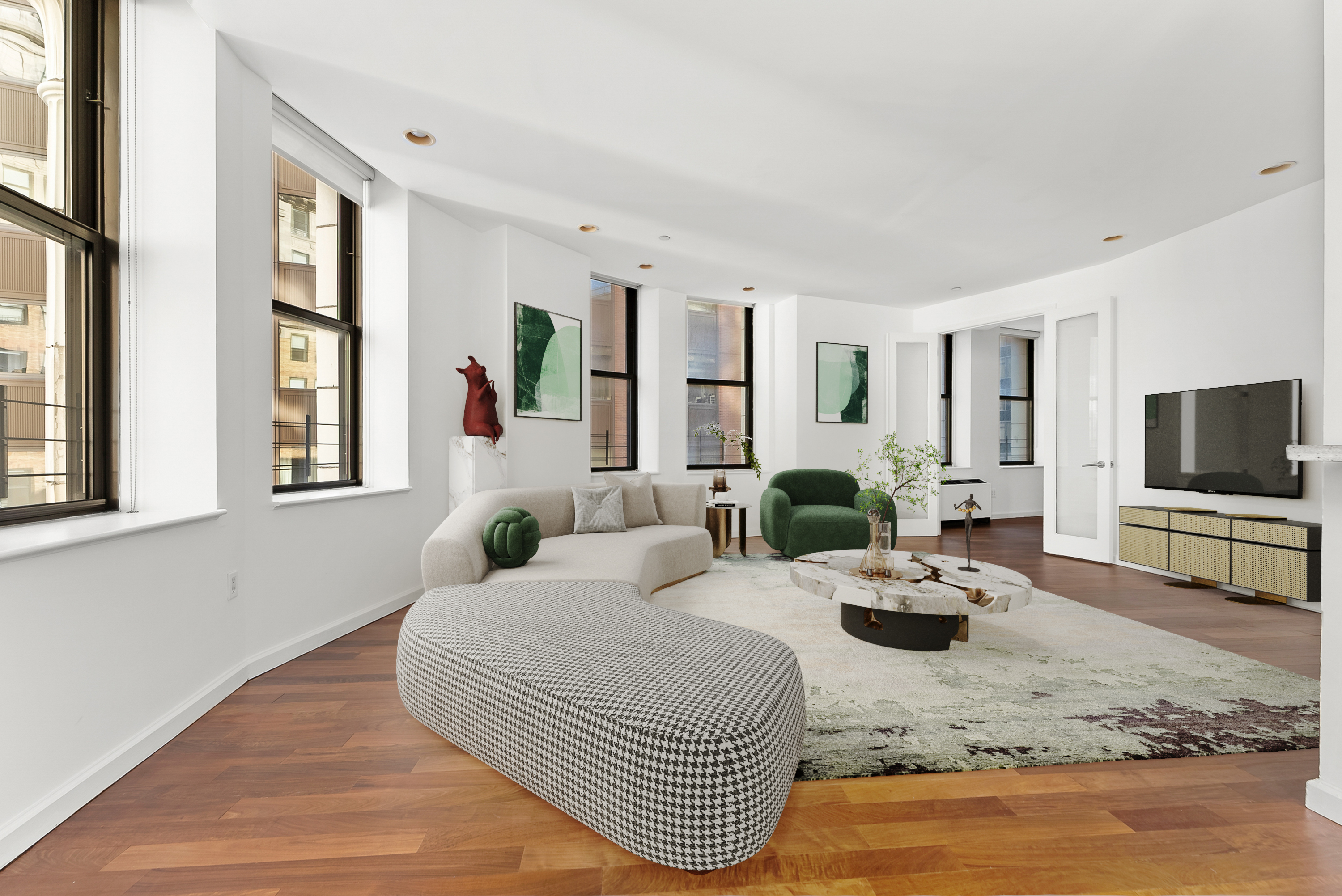 1 Wall Street Court, Unit 1405 Manhattan, NY 10005 - Photo 7 of 19 a view of a livingroom with furniture and a flat screen tv