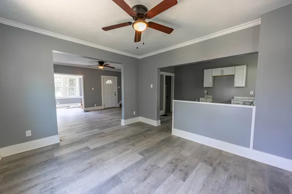 a view of a kitchen with a sink and a cabinet
