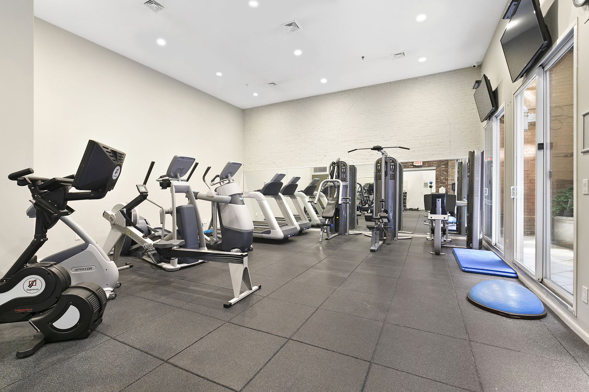 25 Murray Street, Unit 4A Manhattan, NY 10007 - Photo 9 of 11 a view of a room with gym equipment