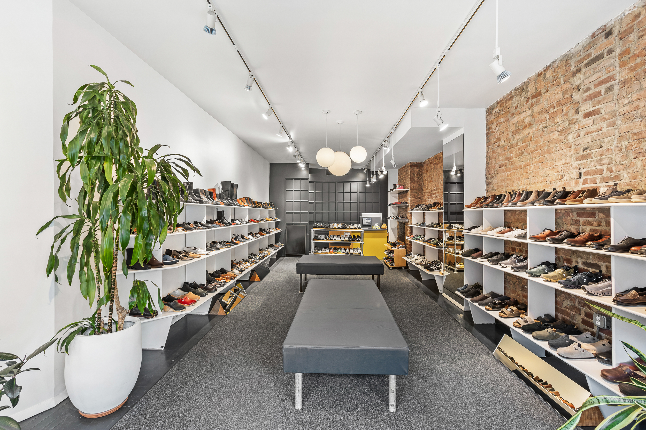 185 Smith Street Brooklyn, NY 11201 - Photo 2 of 14 a room with gym equipment and a view of living room