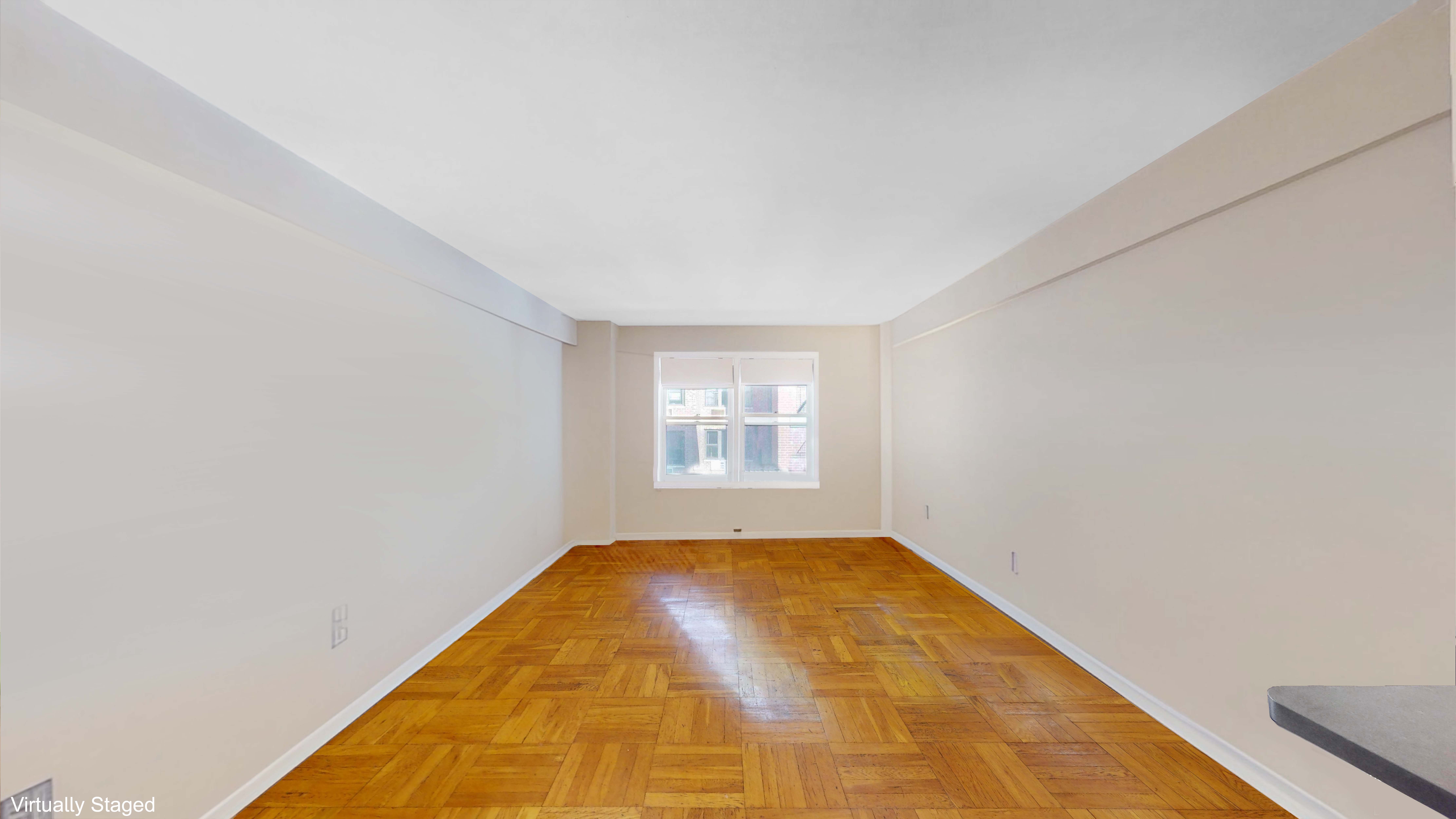 515 East 85th Street, Unit 6A Manhattan, NY 10028 - Photo 10 of 11 a view of a big room with windows