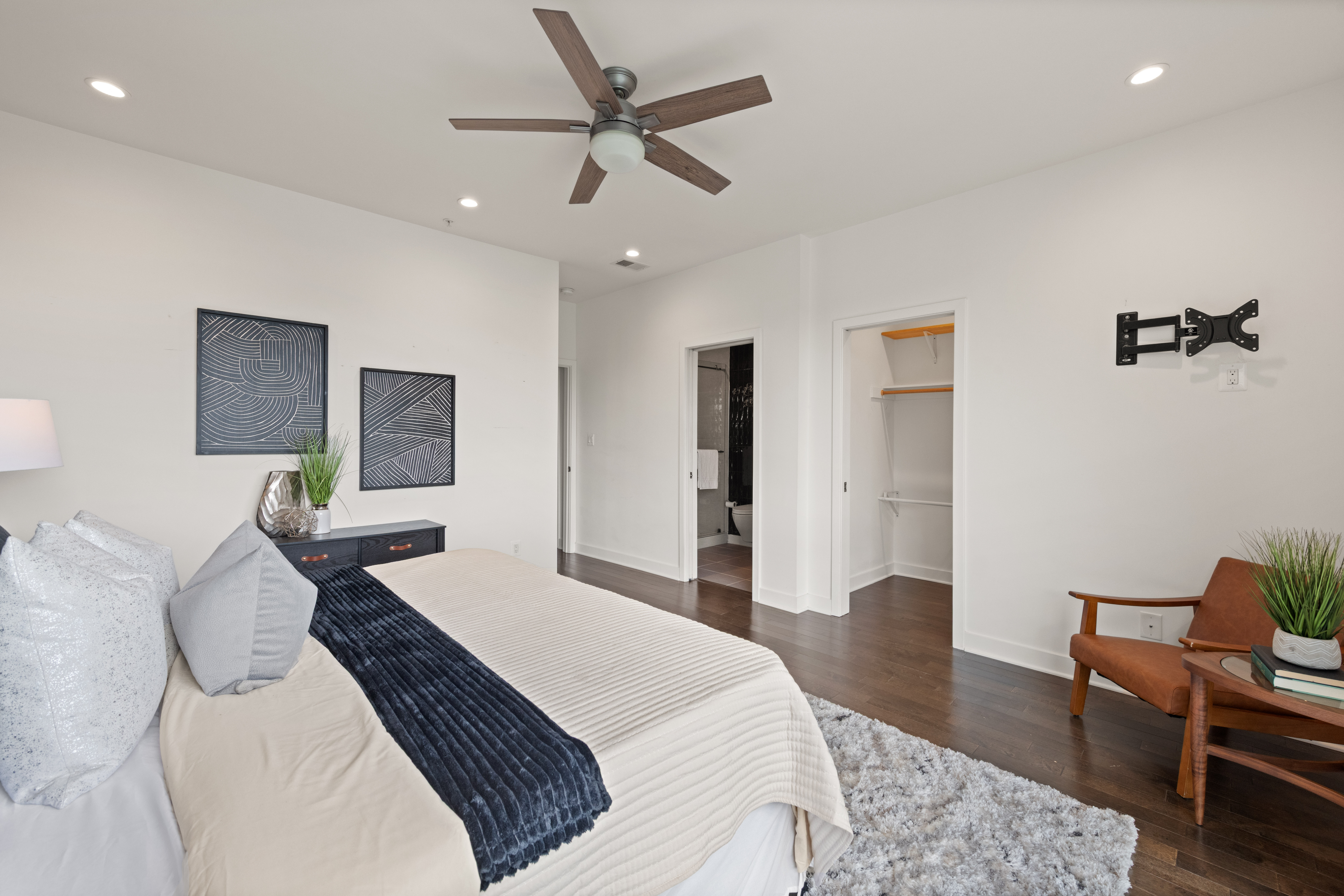 319 Varnum Street Northwest, Unit 3 Washington, DC 20011 - Photo 15 of 29 a bedroom with a bed a table and chair