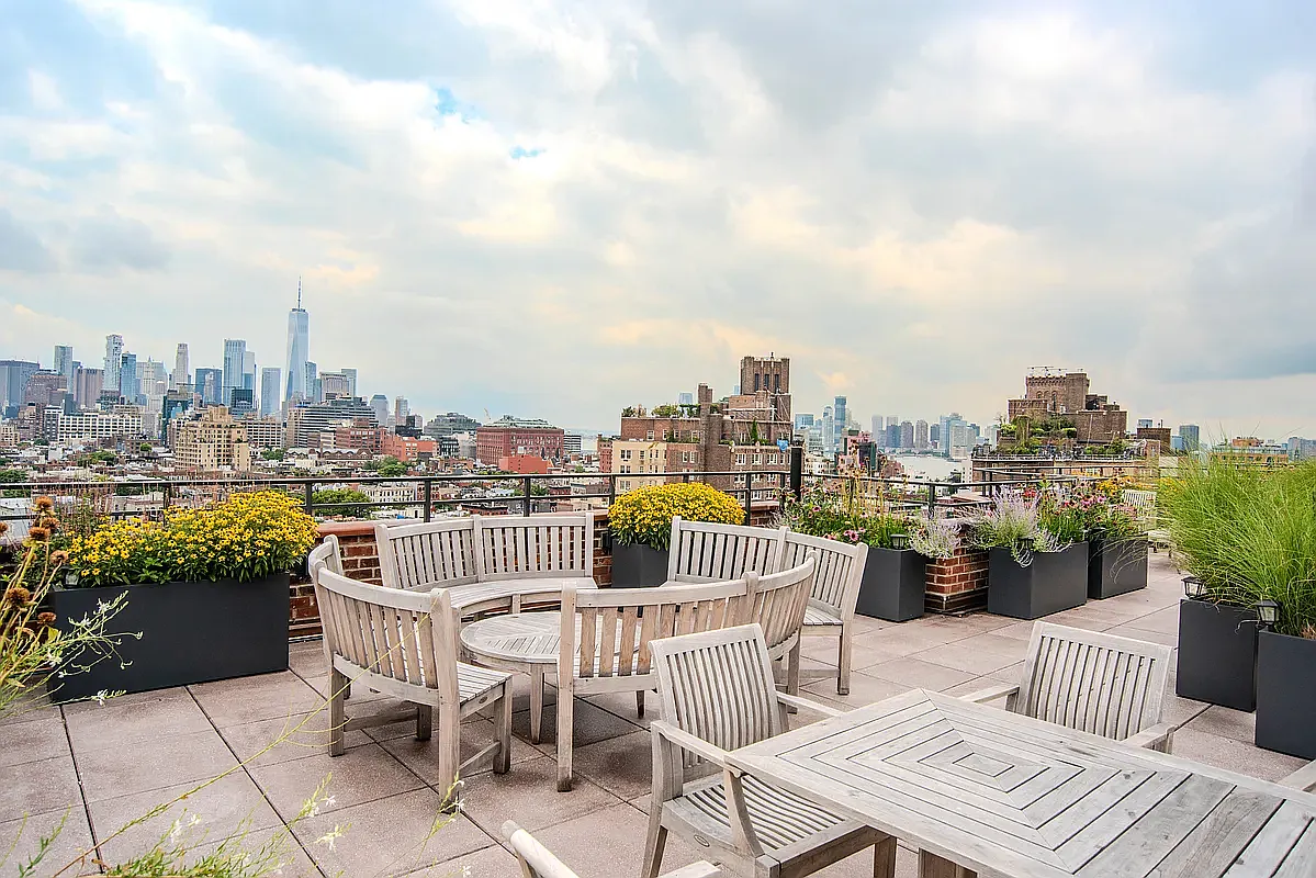 31 Jane Street, Unit 16G Manhattan, NY 10014 - Photo 19 of 20 a view of a roof deck with furniture