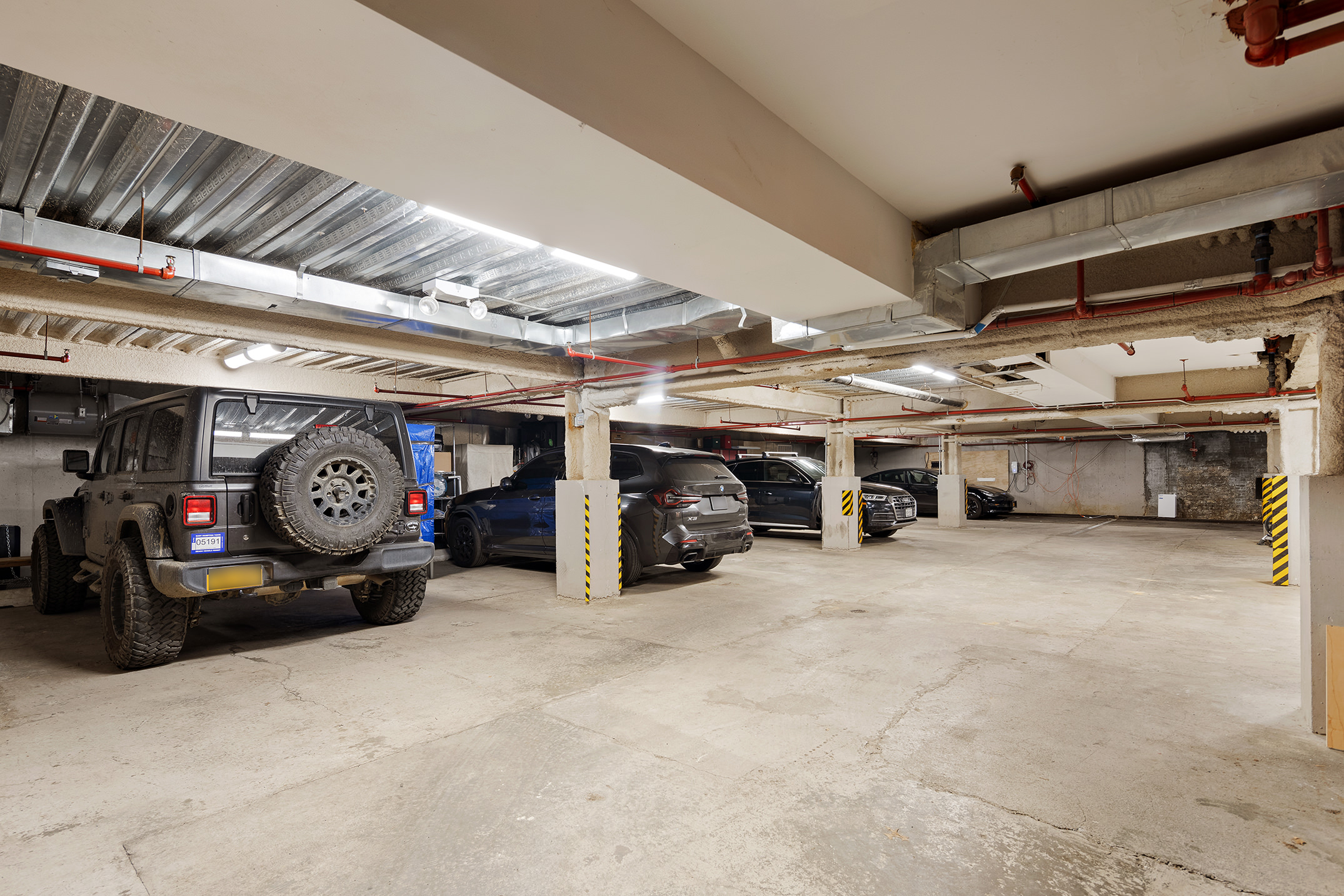 172 North 10th Street, Unit 3D Brooklyn, NY 11211 - Photo 15 of 16 a view of a garage with furniture