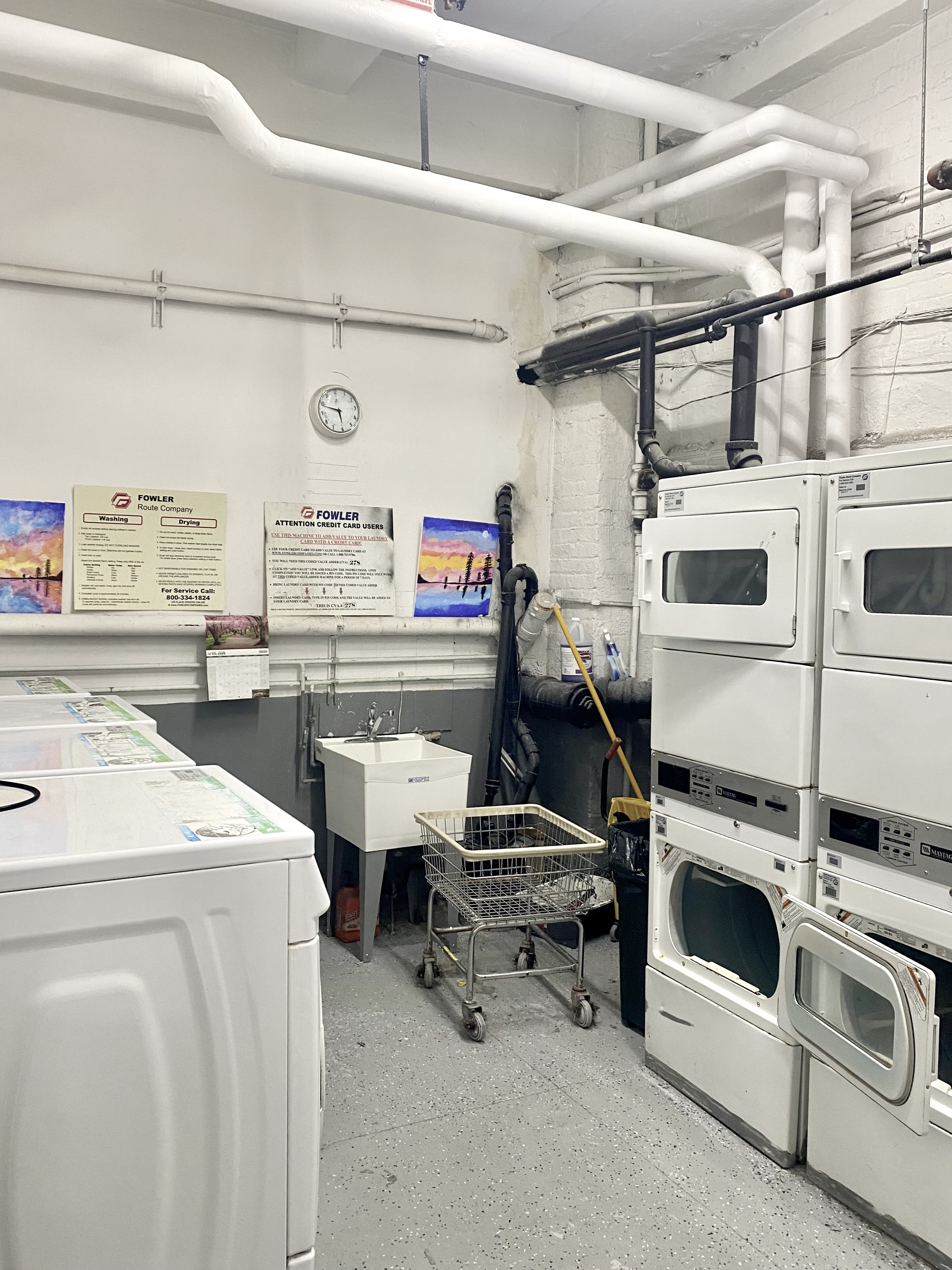 210 West 16th Street, Unit PH Manhattan, NY 10011 - Photo 13 of 16 a utility room with dryer and washer