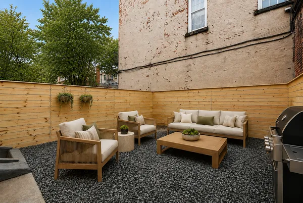 a outdoor living room with furniture