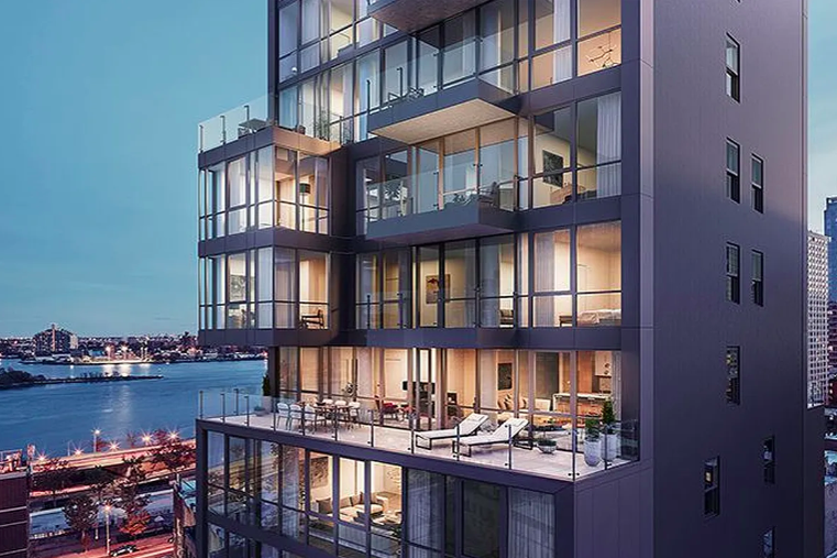 302 East 96th Street, Unit 1302 Manhattan, NY 10128 - Photo 16 of 17 a view of a brick building next to a lake view