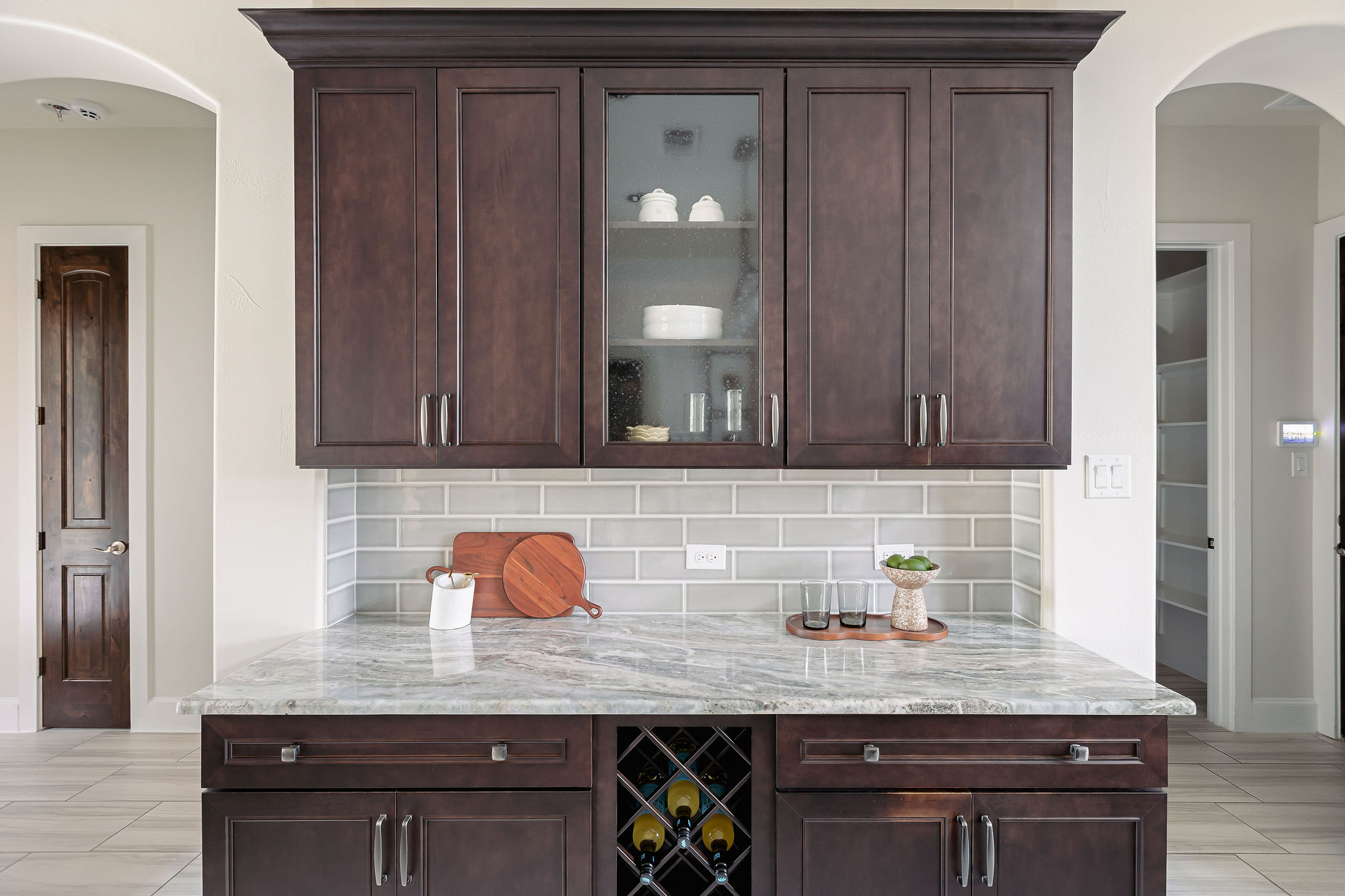 812 Jennings Branch Georgetown, TX 78633 - Photo 29 of 100 a kitchen with granite countertop wooden cabinets and a sink