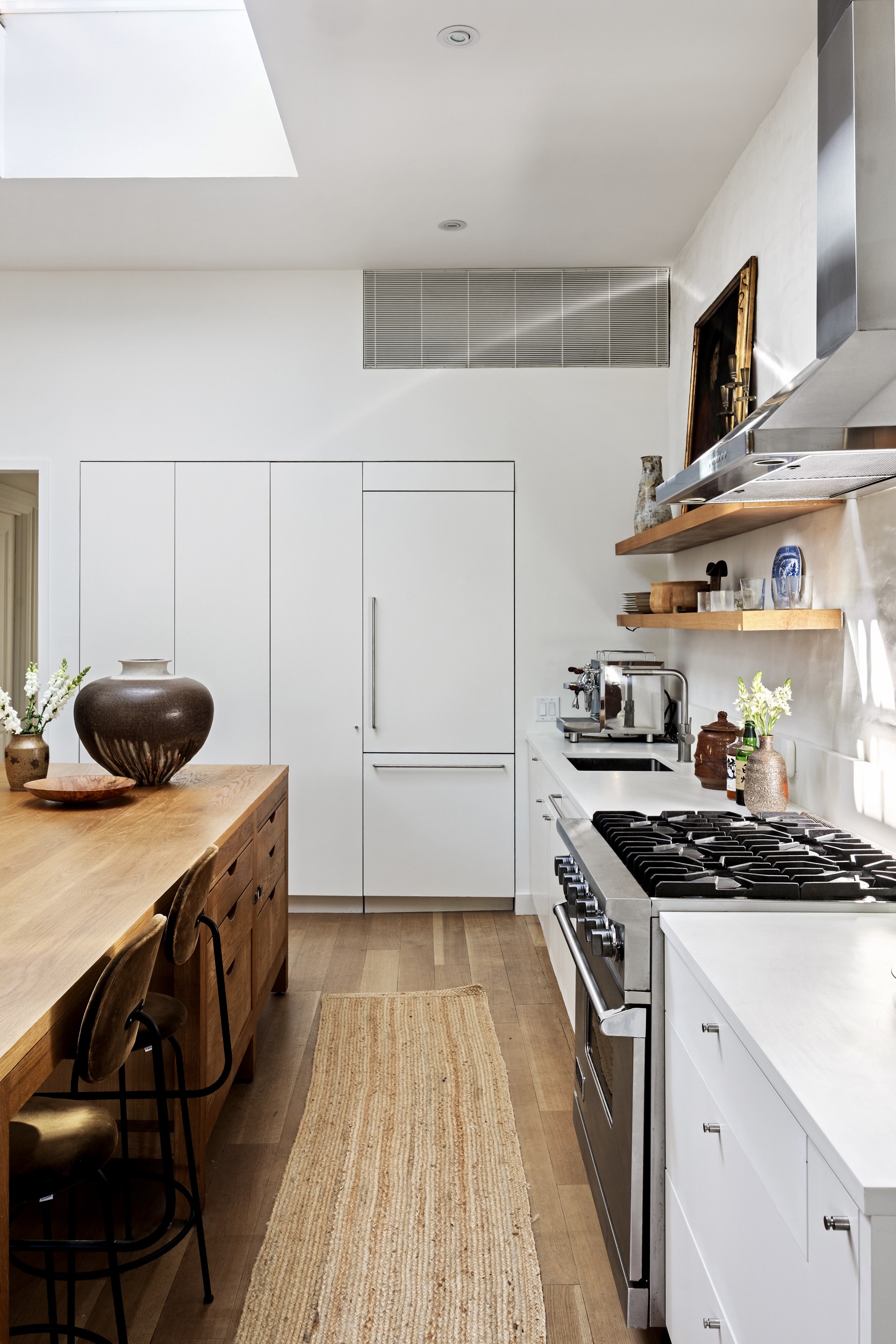 134 Berkeley Place, Unit 3 Brooklyn, NY 11217 - Photo 9 of 30 a kitchen with stainless steel appliances a stove and cabinets