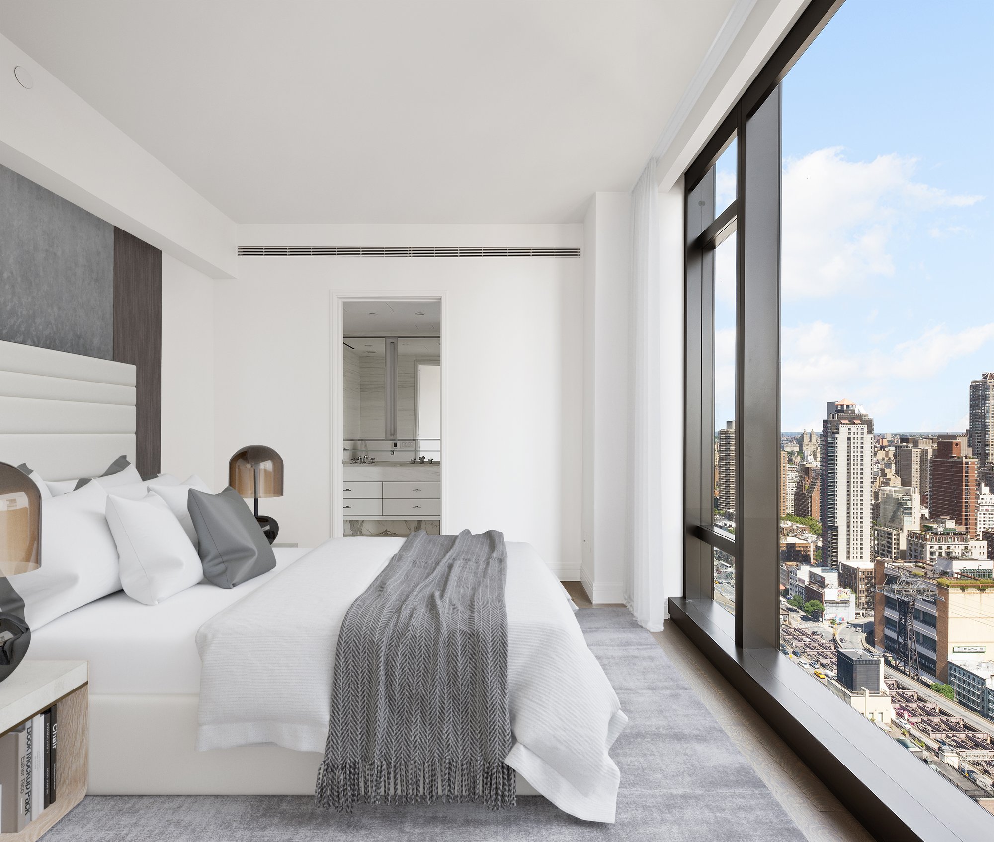 430 East 58th Street, Unit 39A Manhattan, NY 10022 - Photo 7 of 15 a bedroom with a large bed and a large window